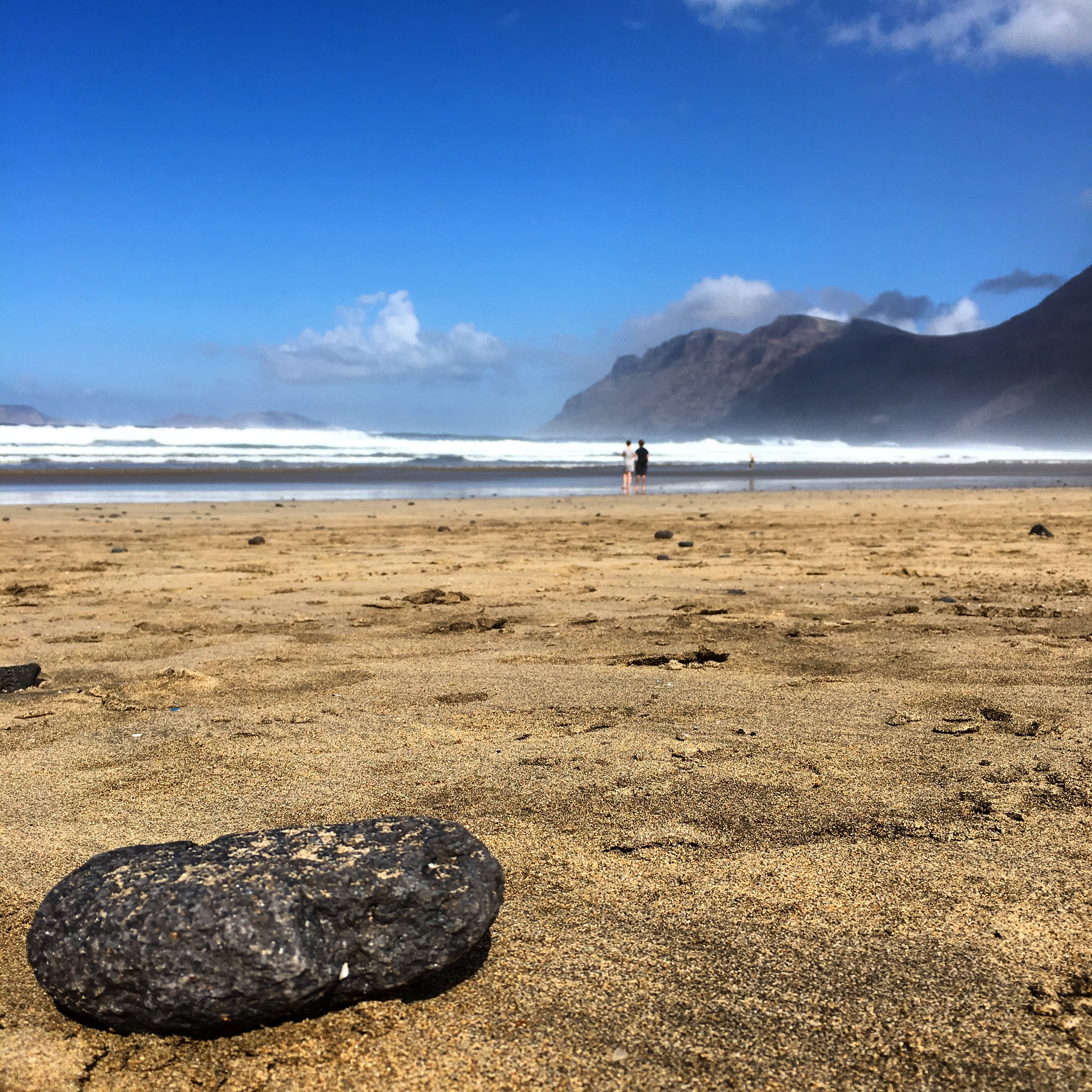 tourism, sea, beach, horizon over water, volcano, volcanic, solid, surfer, water, nature, beauty in nature, sand, famara, mountain, blue, sky, canary, scenery, Phone HD Wallpaper