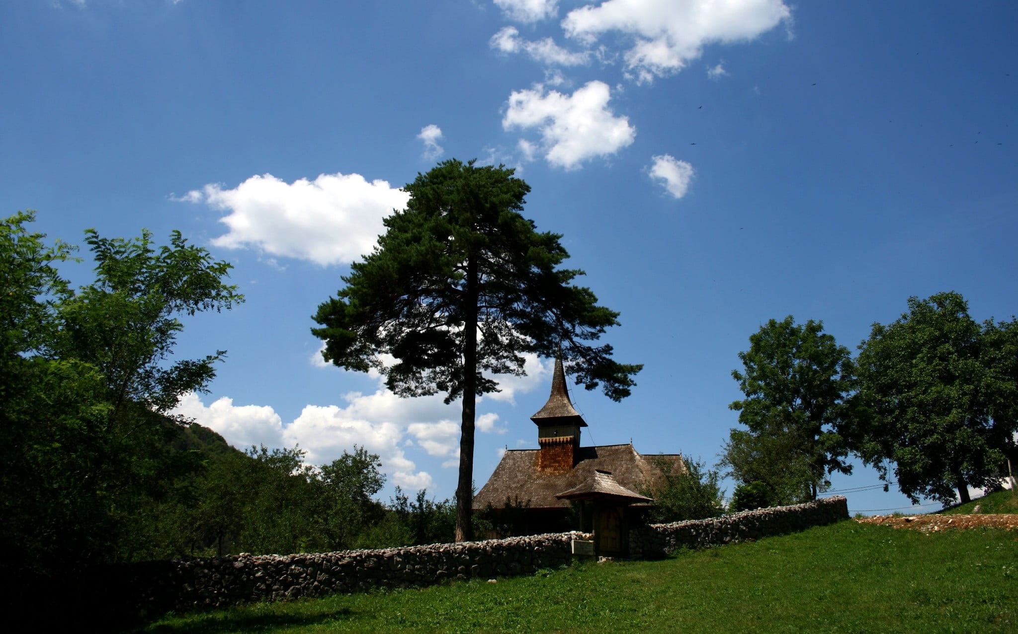 religious, old, land, europe, plant, rural, cloud - sky, 1080P, field, sky, church, green color, christianity, outdoors, tranquility, landscape, building, HD Wallpaper