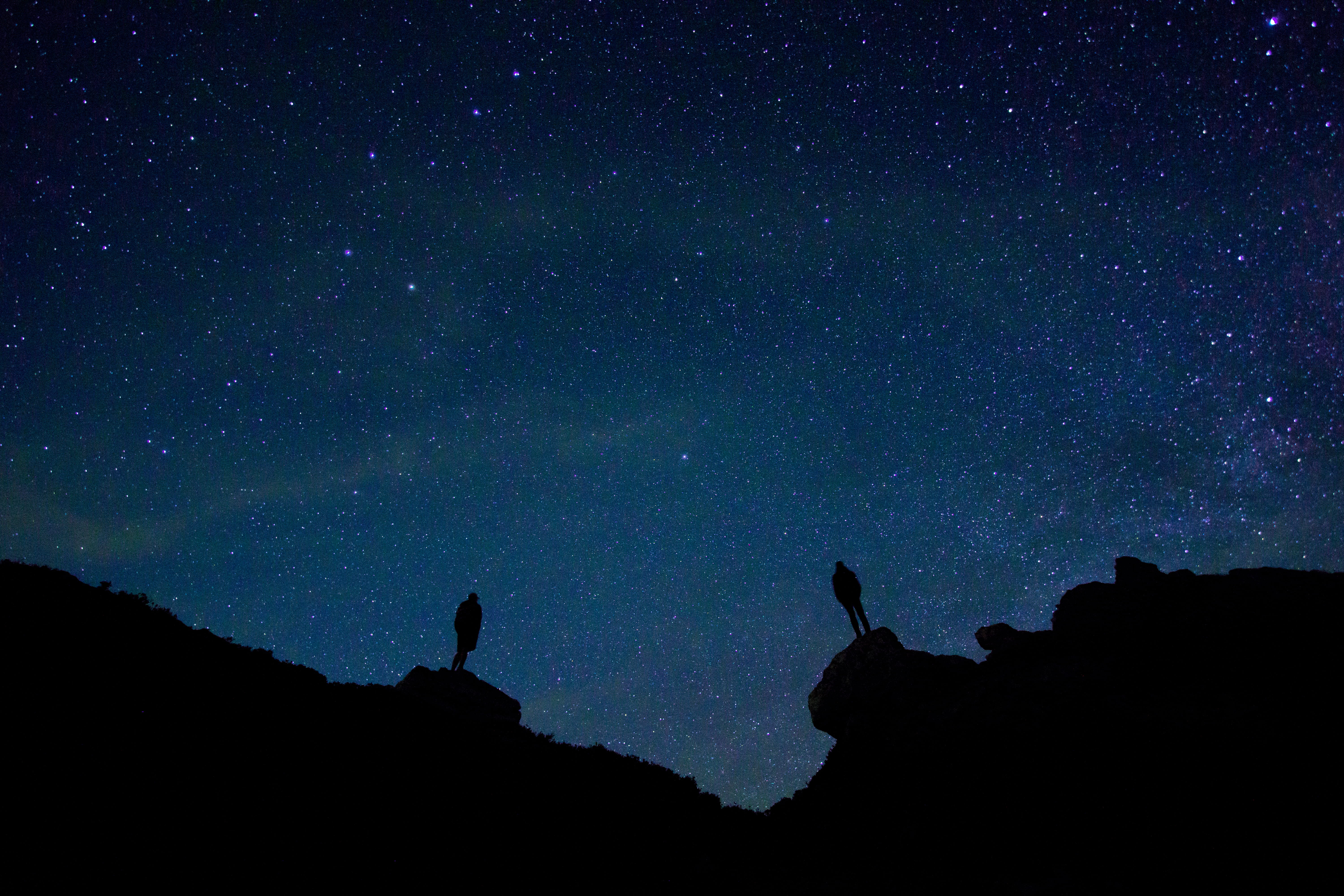 rocks, people, dark, beauty in nature, blue, mountain, star, tranquility, sky, landscape, scenics, galaxy, milky Way, cliff, night sky, space, nature, hiking, HD Wallpaper