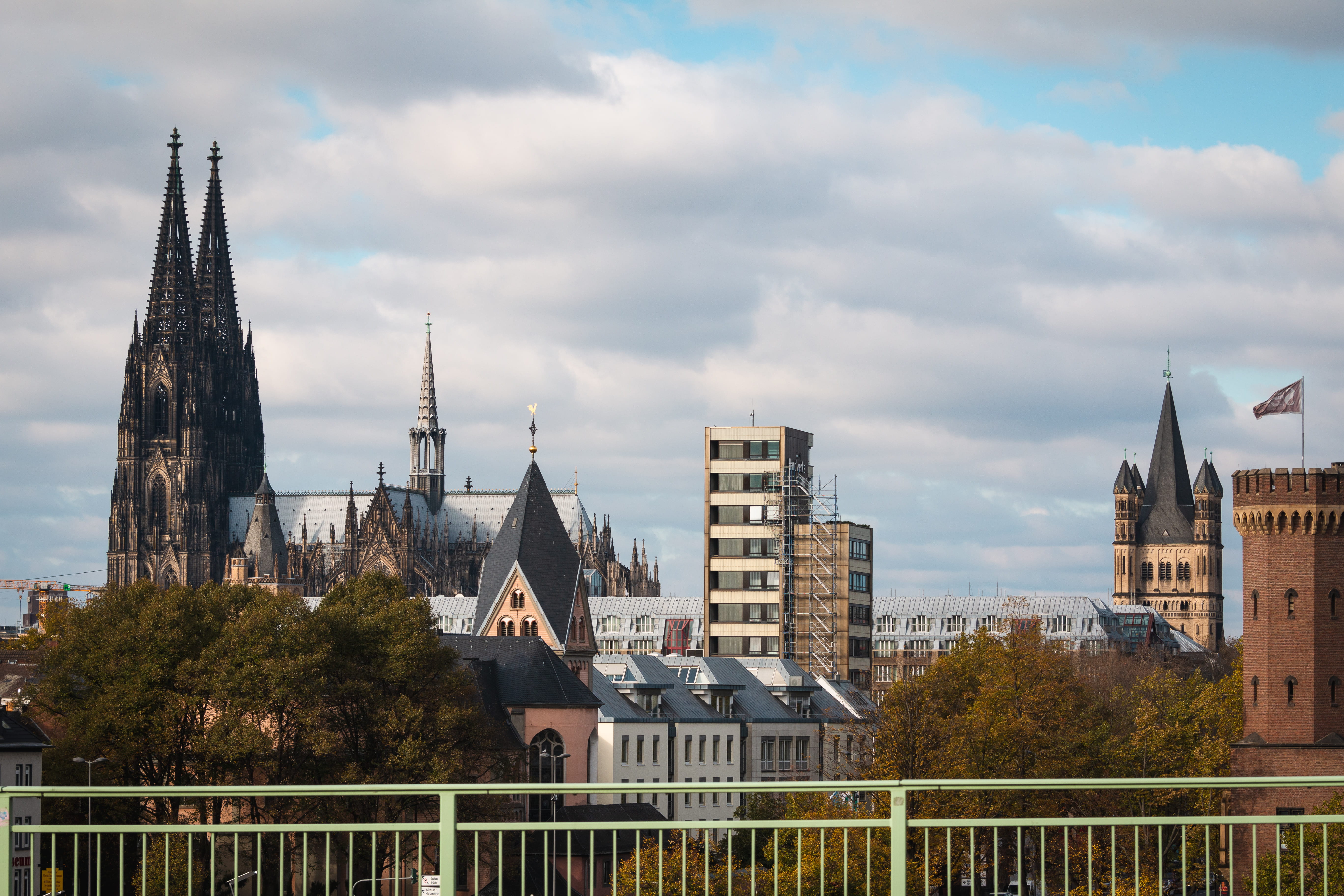 köln, place of worship, spirituality, building, spire, tower, built structure, tree, cloud - sky, day, sky, plant, bridge, cityscape, religion, belief, HD Wallpaper