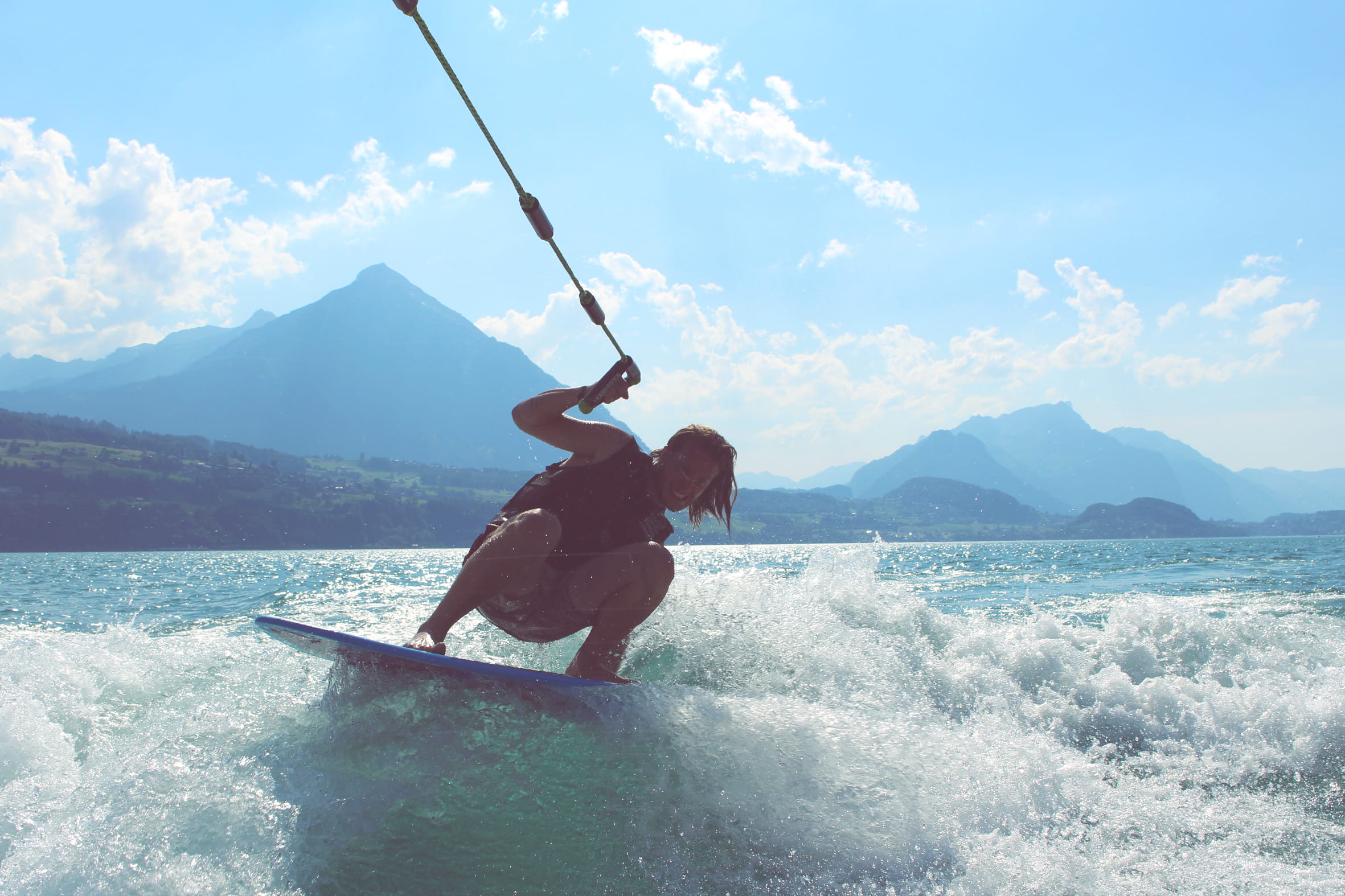 adventure, born, surf, scenics - nature, sunlight, lake, people, real people, arms raised, water, switzerland, be, day, human arm, mountain range, wake, HD Wallpaper