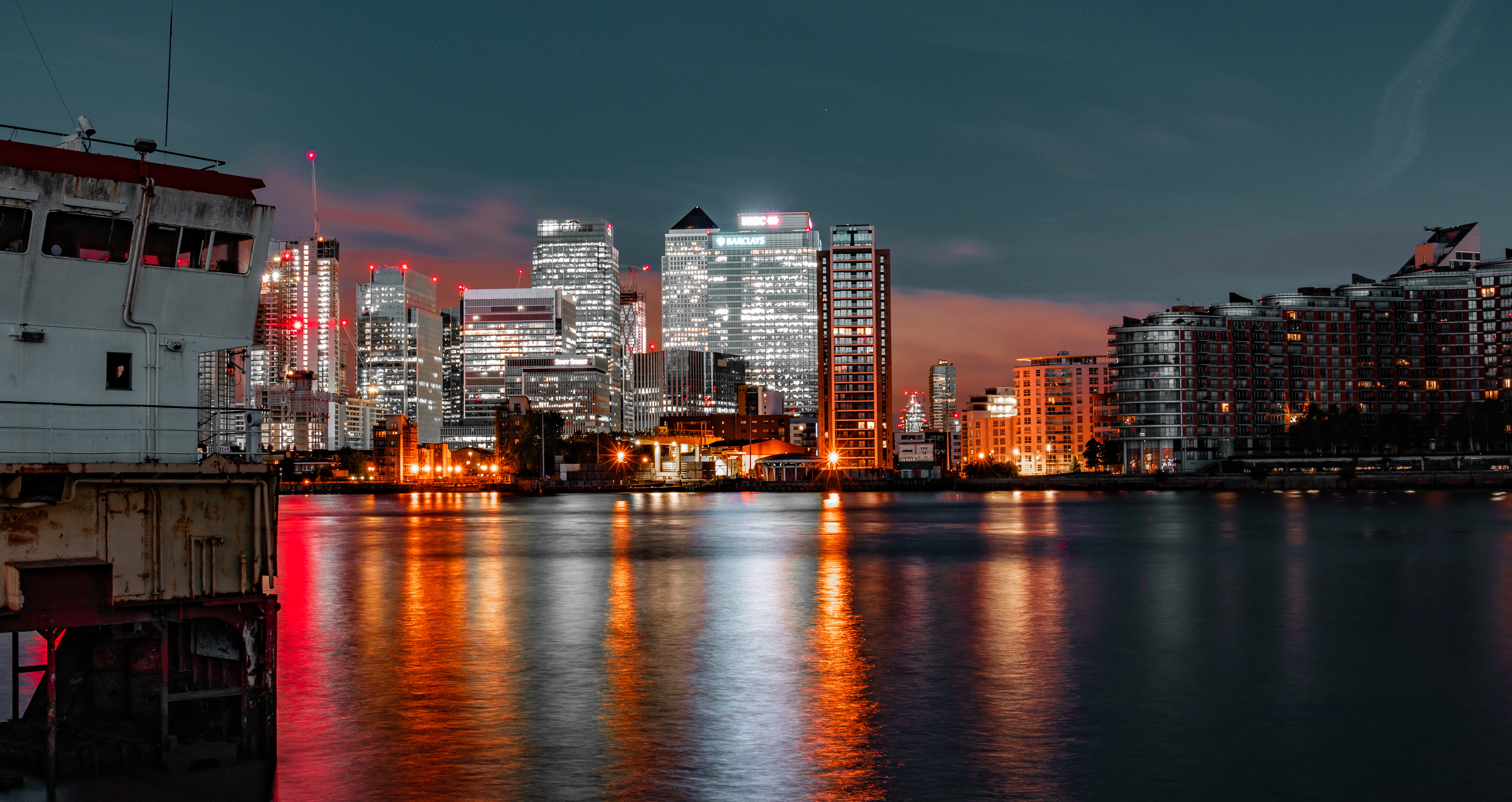 high, boat, building, 5K, modern, illuminated, cityscape, skyscraper, water, built structure, near, rise, sky, port, reflection, financial district, apartment building, HD Wallpaper
