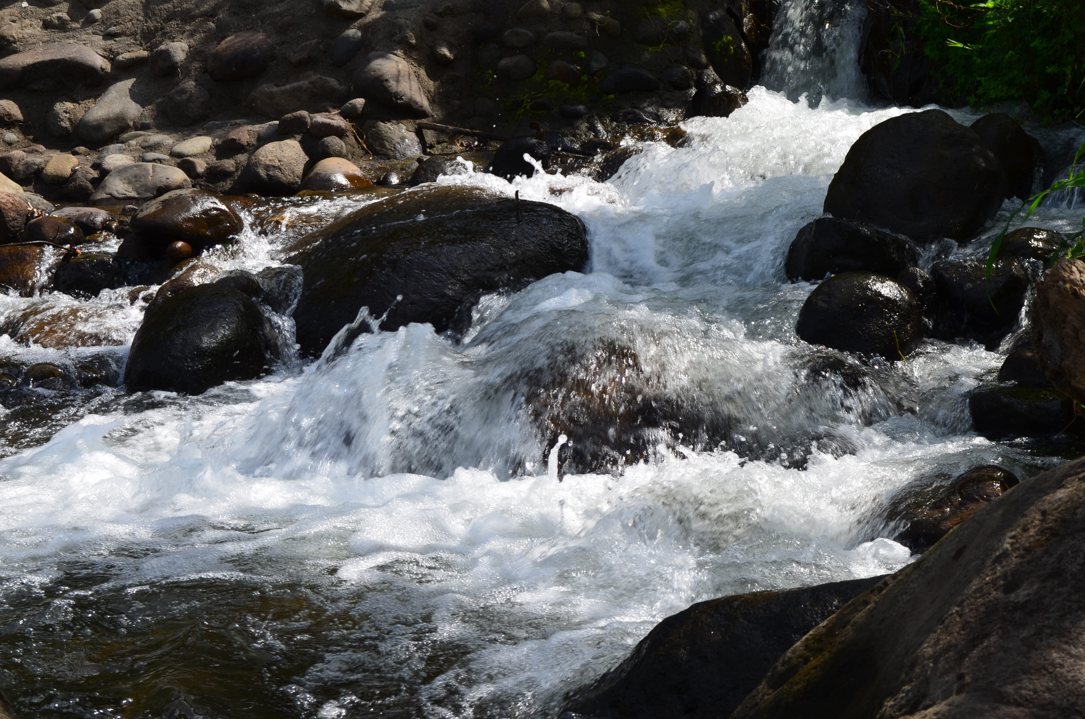 sea, rock - object, flowing, day, splash, fluid, river, scenic, rock, outdoors, power in nature, natural, wet, waterfall, stone, stream, creek, no people, HD Wallpaper