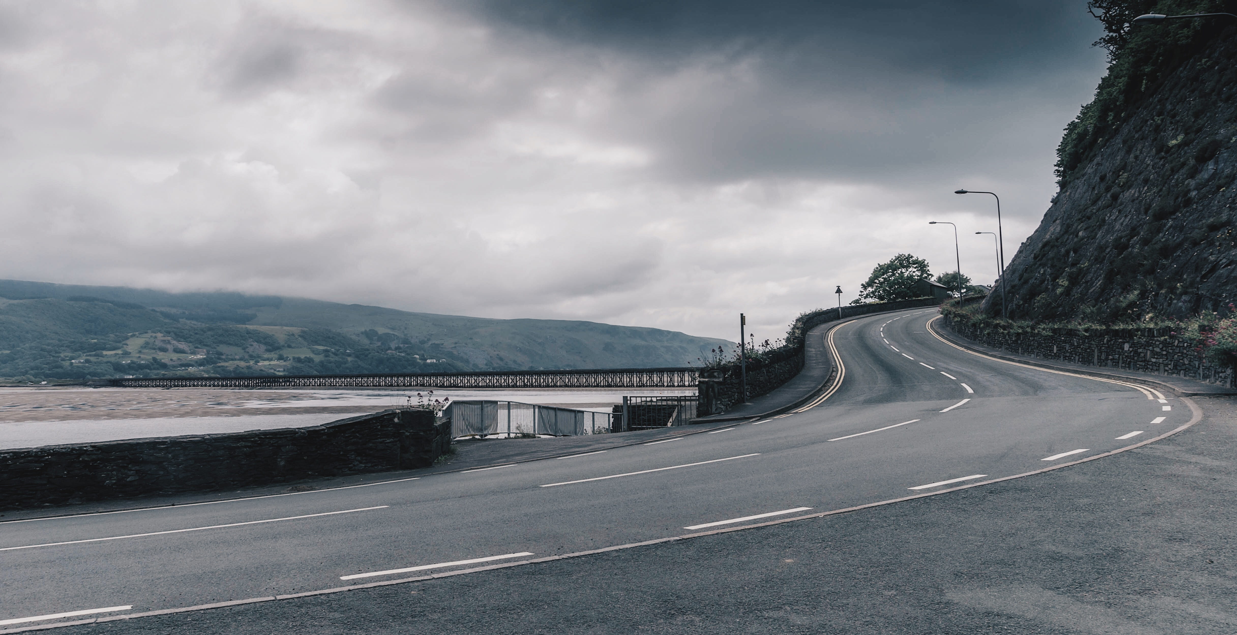 nature, uk, united kingdom, the way forward, scenics - nature, mountain range, ocean, cloud - sky, no people, road, marking, snowdonia, 4K, symbol, crash barrier, HD Wallpaper