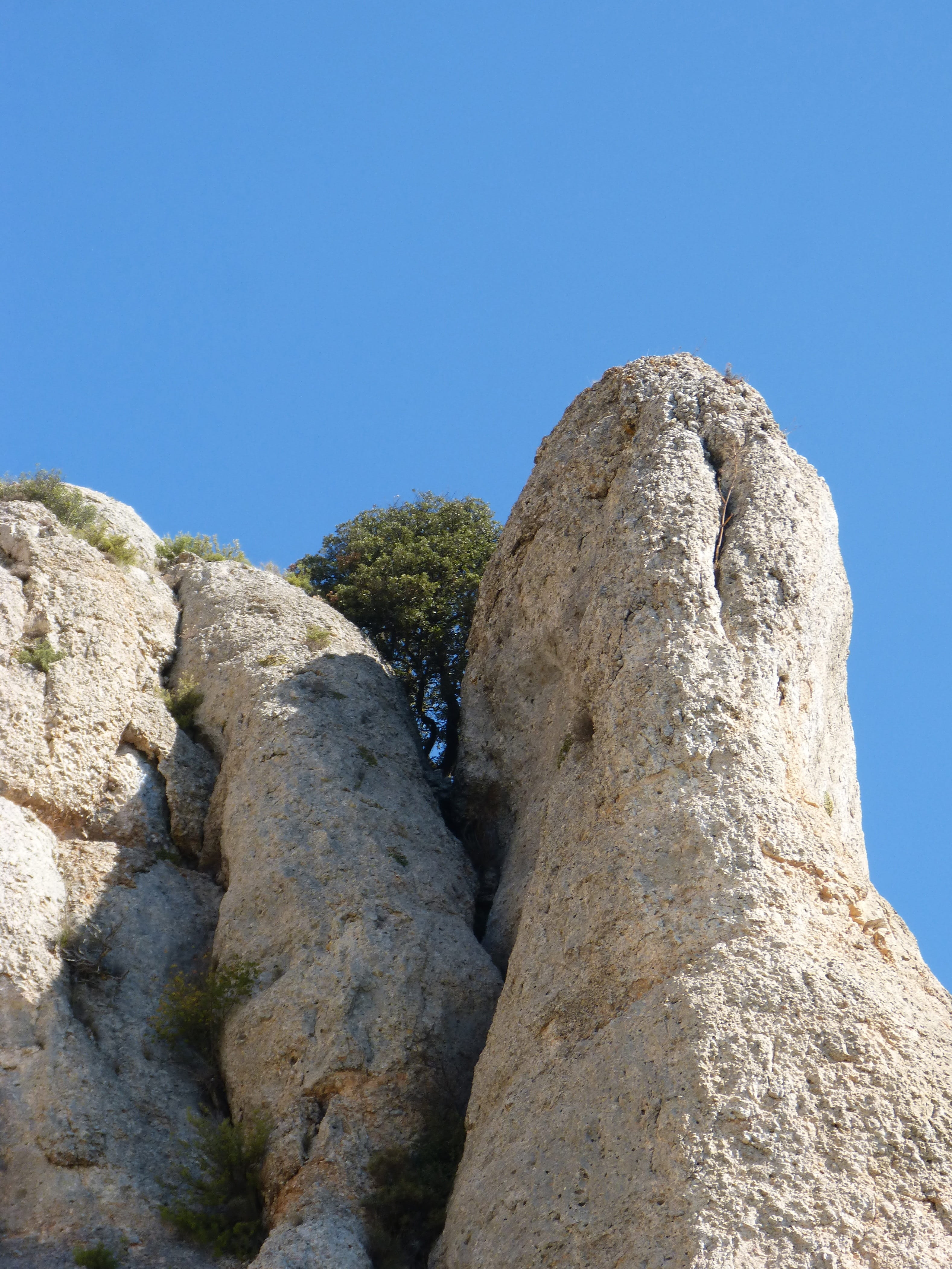 rock - object, Survivor, rock formation, low angle view, blue, lifestyles, leisure activity, 4K, day, sunlight, Needle Rock, clear sky, one person, rocks, Phone HD Wallpaper