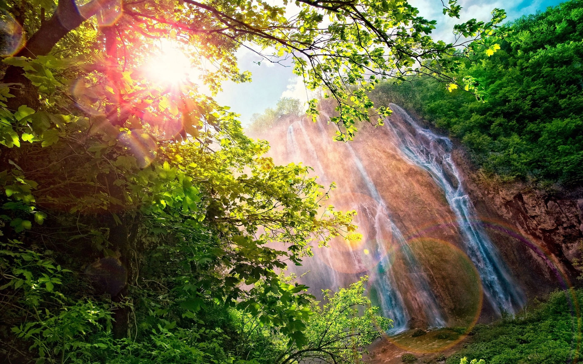 environment, forest, motion, tranquil scene, travel Destinations, lens flare, flowing Water, land, uncultivated, growth, tropical Climate, patches of light, HD Wallpaper