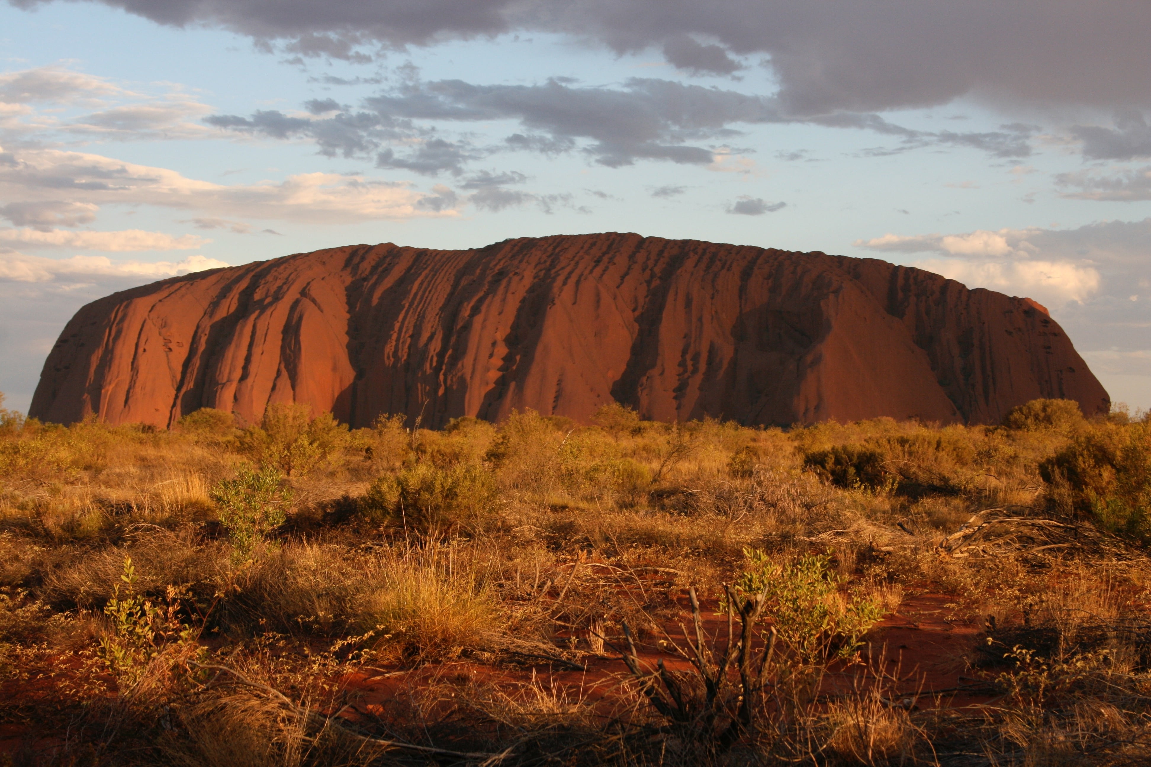 red, territory, non-urban scene, land, cloud - sky, mountain, uluru, travel, remote, tranquil scene, nature, outback, beauty in nature, idyllic, desert, HD Wallpaper
