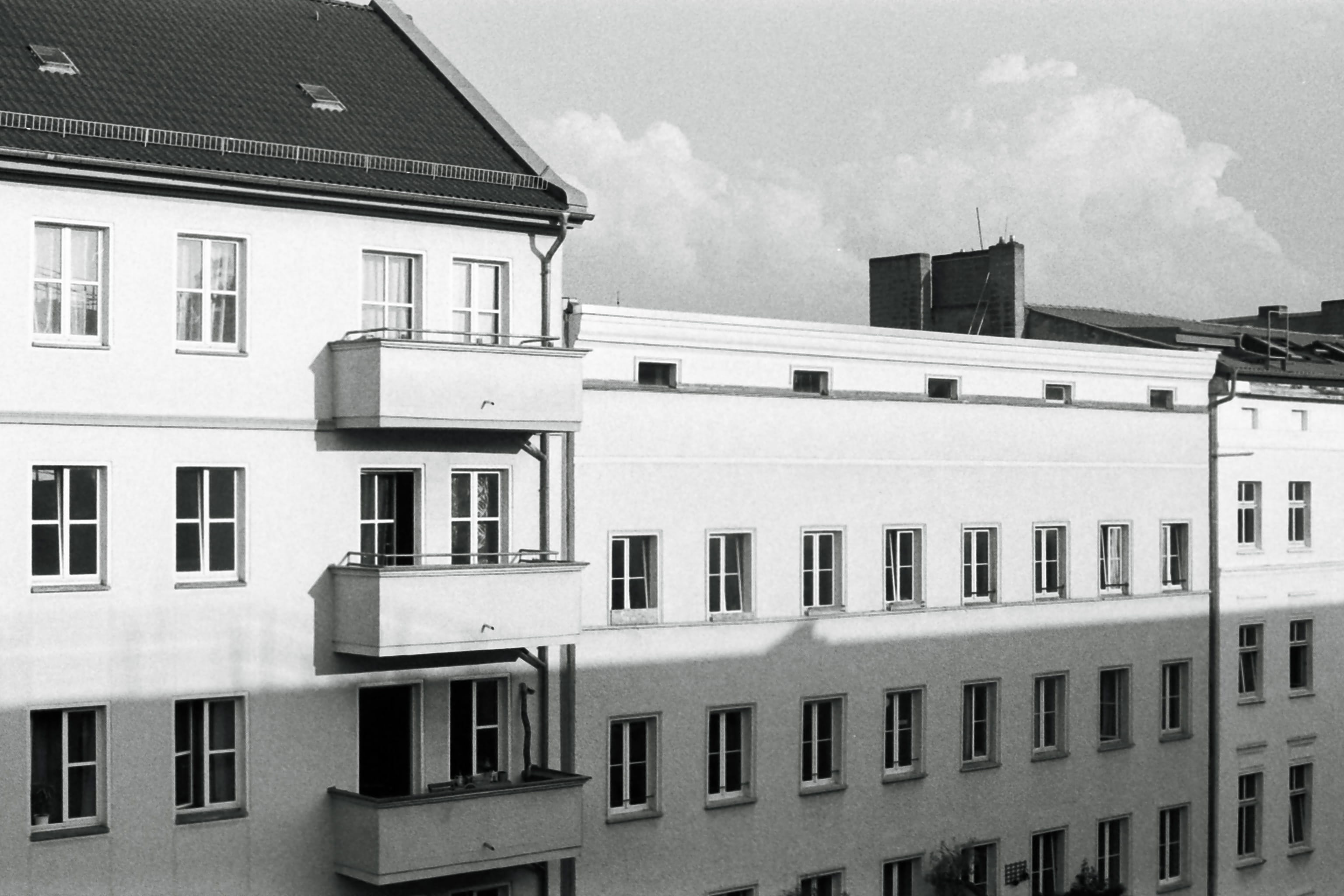 city life, ilford, city, film, sky, roof, cloud - sky, clouds, low angle view, building exterior, side by side, window, racionalism, built structure, scene, HD Wallpaper