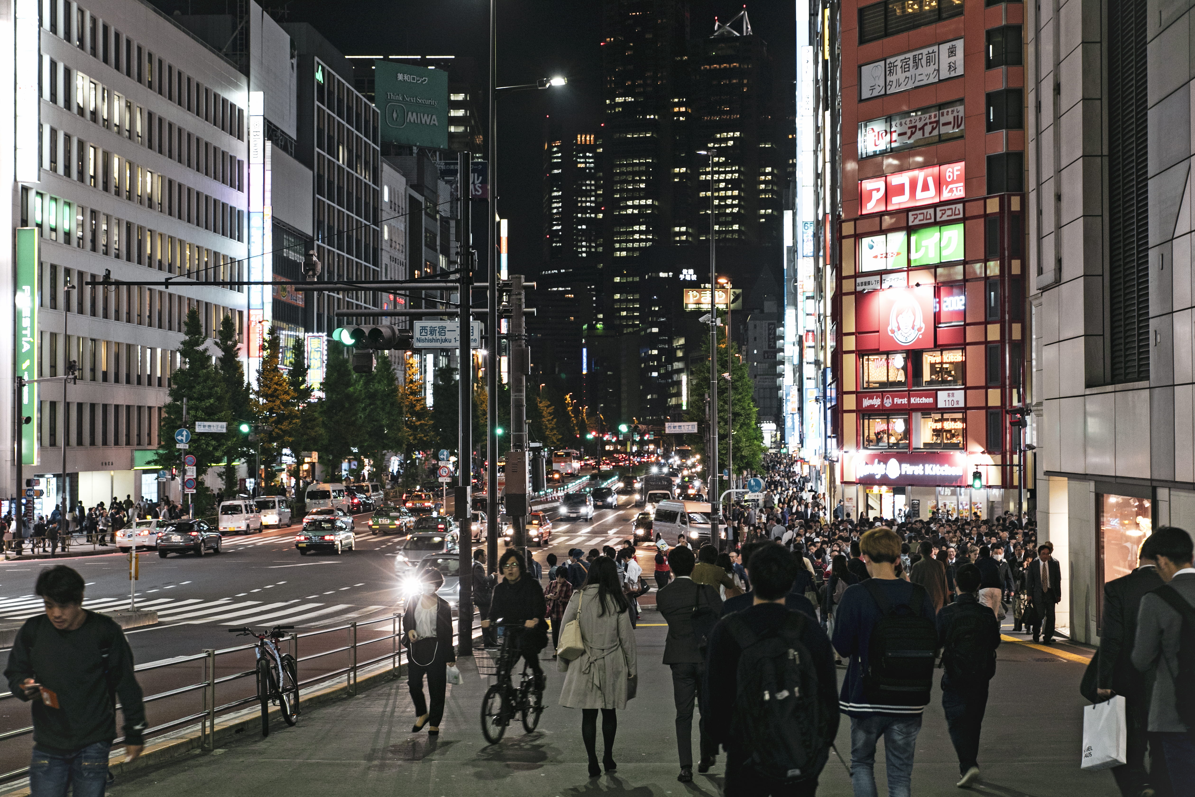 office building exterior, shinjuku, walking, japan, transportation, road, large group of people, building exterior, illuminated, friday, real people, night, HD Wallpaper