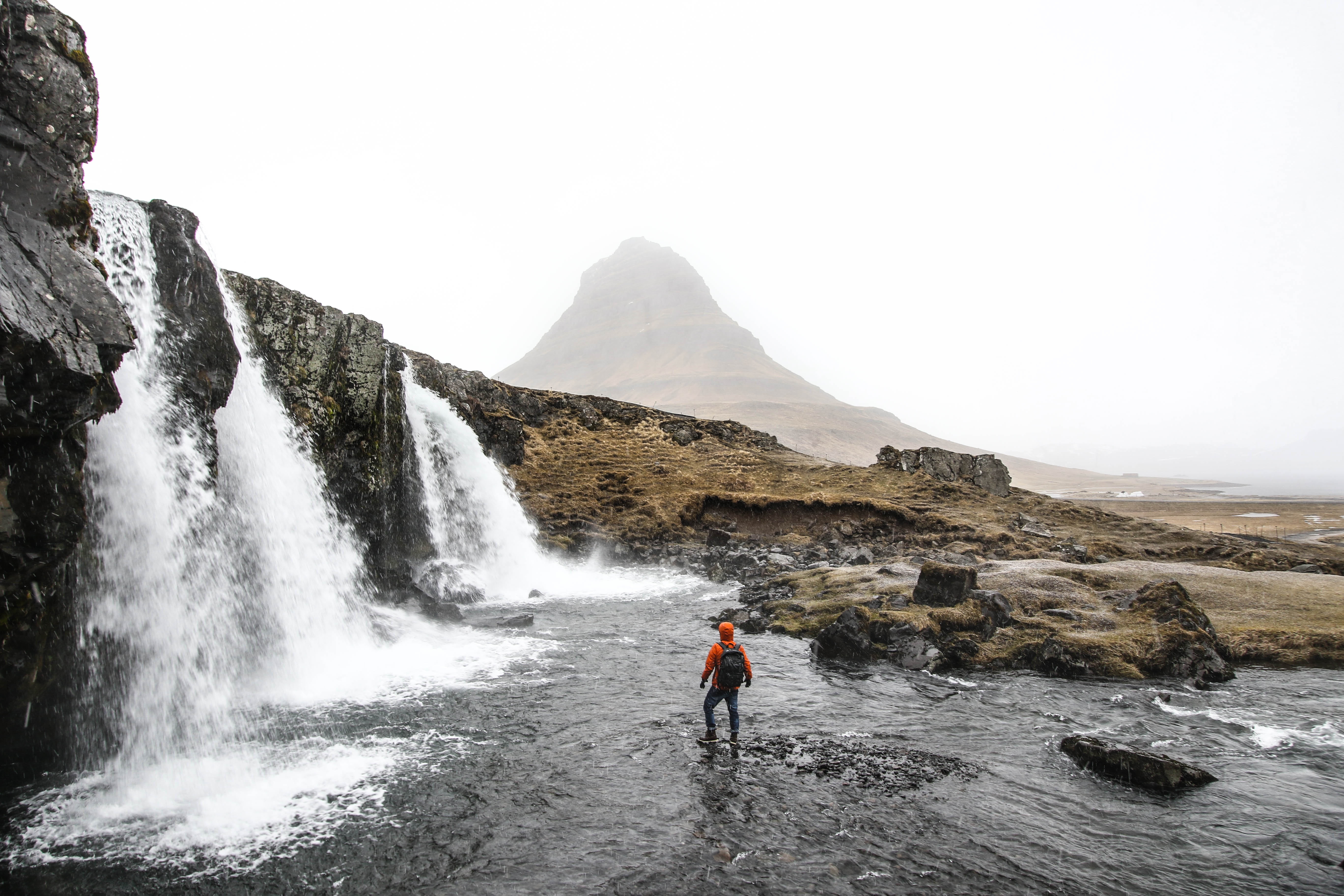sky, adventure, rocks, iceland, 5K, one person, flowing water, man, people, scenics - nature, motion, highland, landscape, cliff, full length, leisure activity, HD Wallpaper