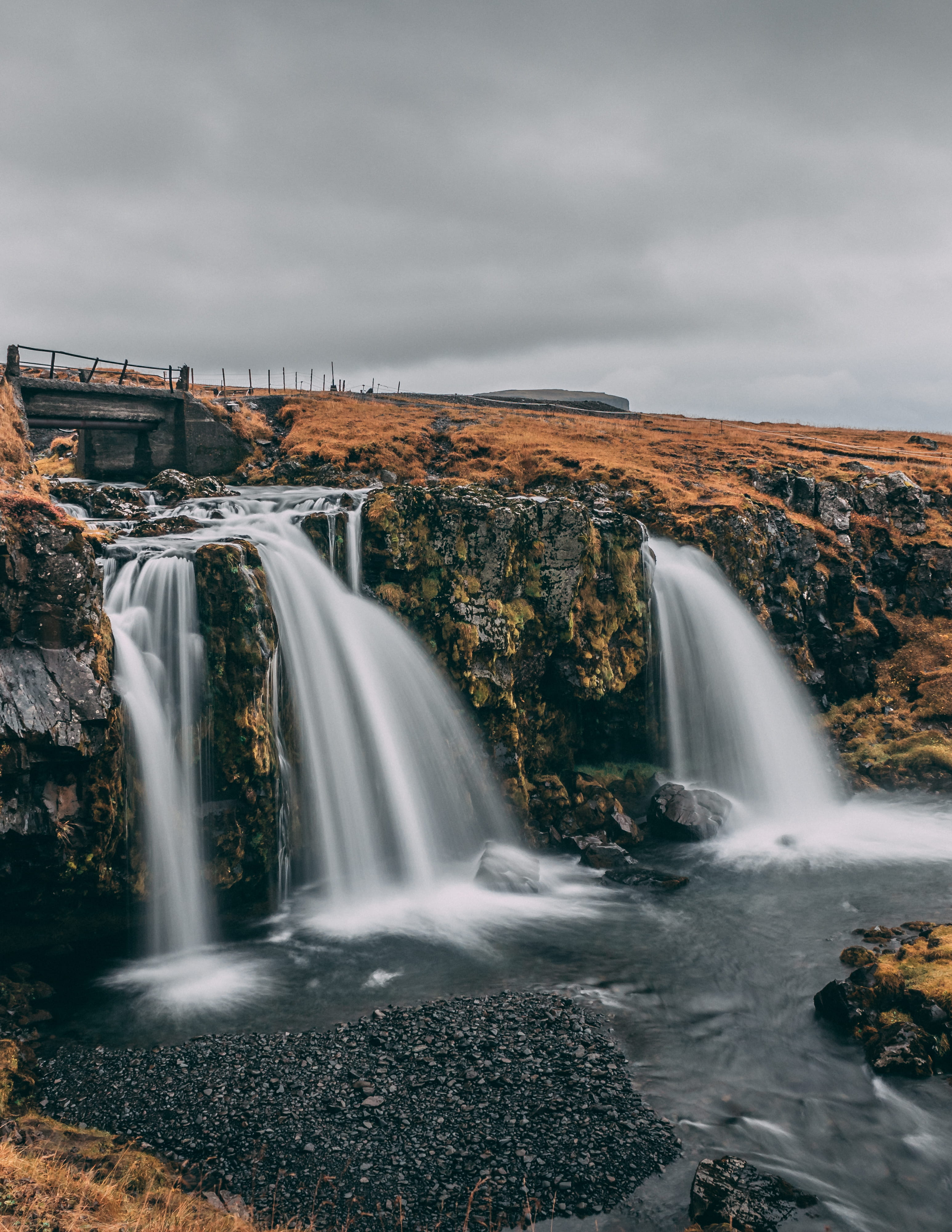 waterfall, scenics - nature, iceland, kirkjufellsnoss, falls, travel, beauty in nature, cliff, cloud - sky, movement, non-urban scene, water, blurred motion, Phone HD Wallpaper