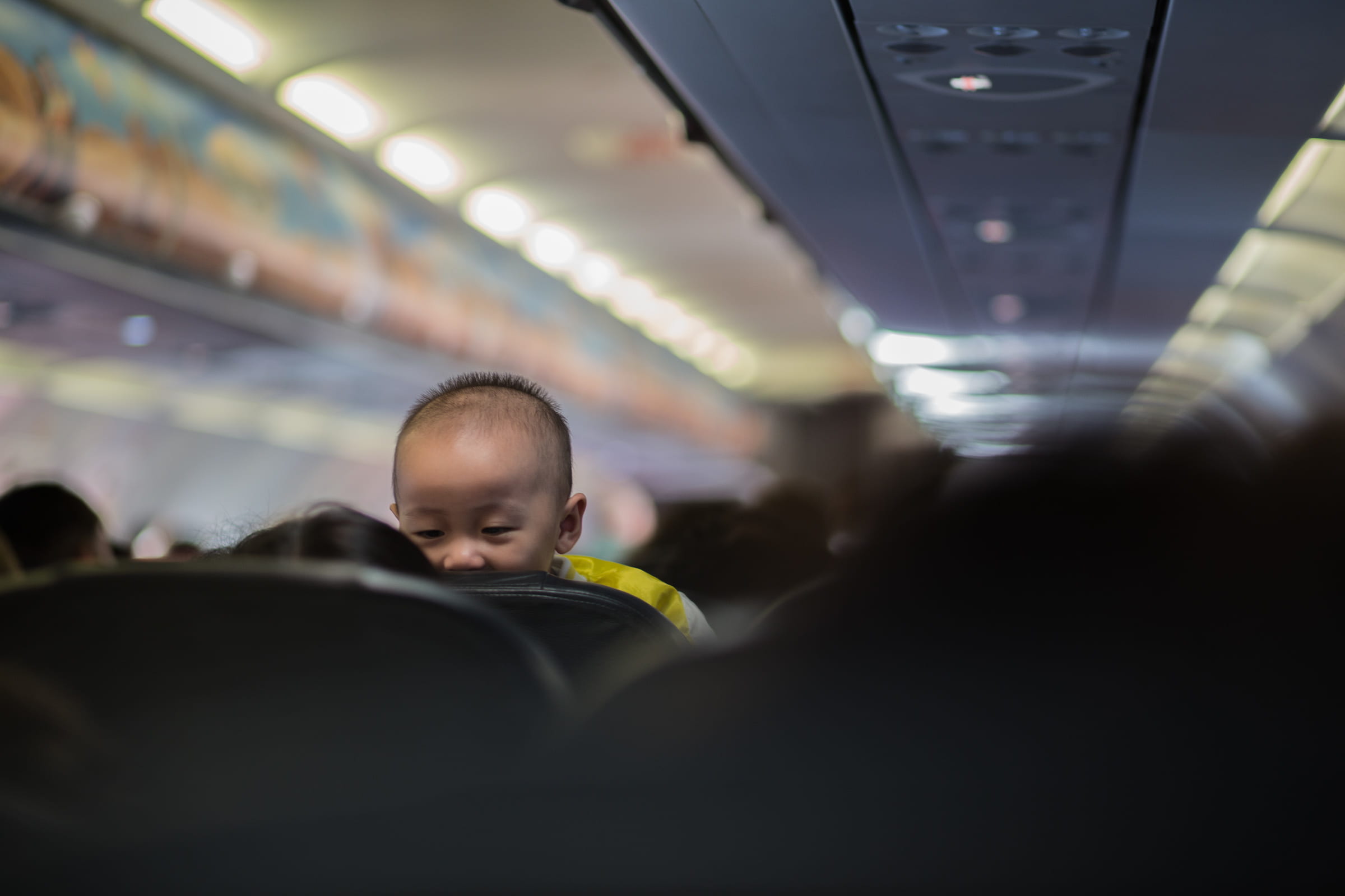 males, passenger, vehicle seat, back, headshot, travel, sneaking, child, offspring, 1080P, airplane, air vehicle, cabin, vehicle interior, transportation, HD Wallpaper