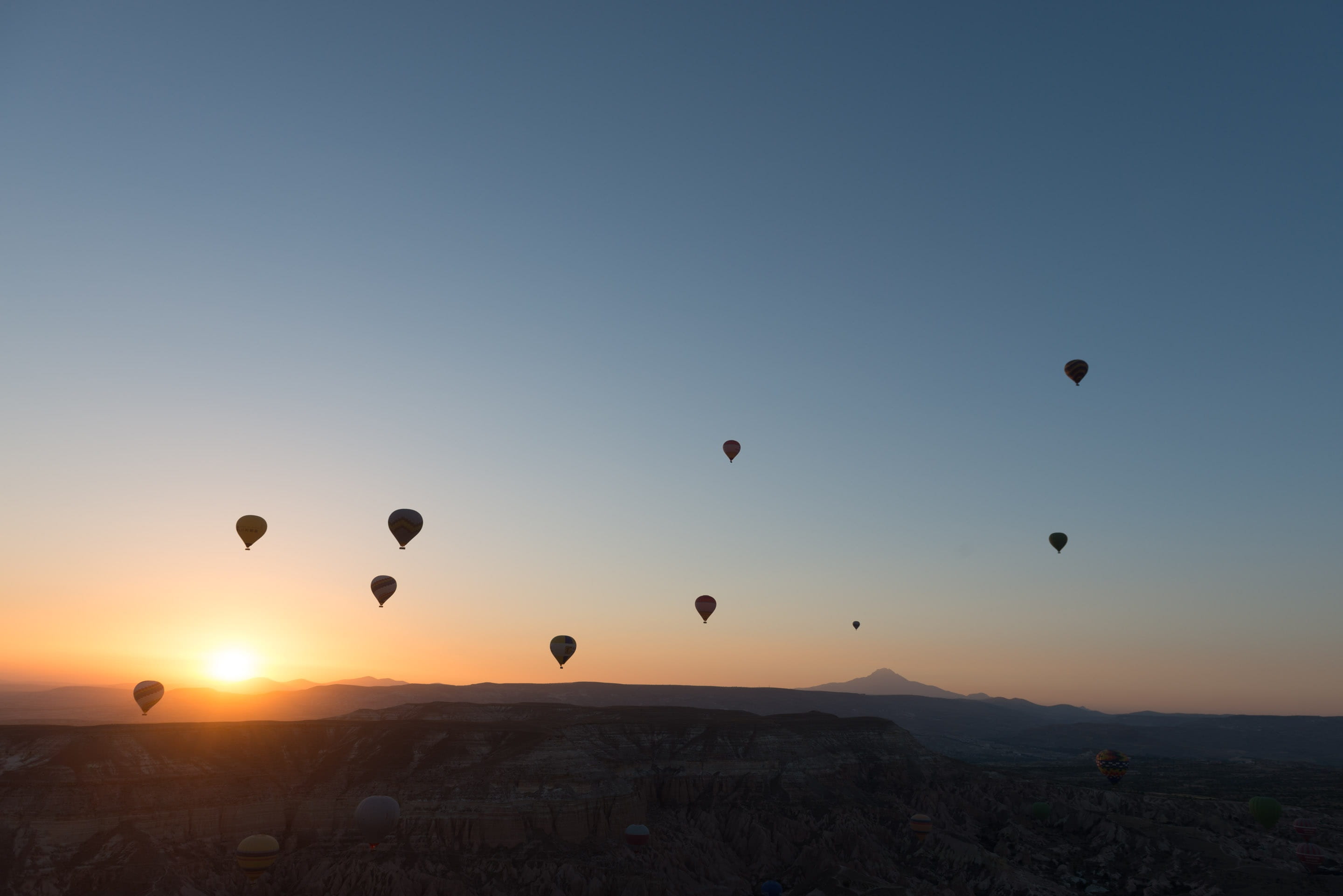 mountain, baloon, landscape, ballooning festival, transportation, aerostatic globe, Cappadocia, adventure, flying, scenics - nature, no people, dawn, air vehicle, HD Wallpaper