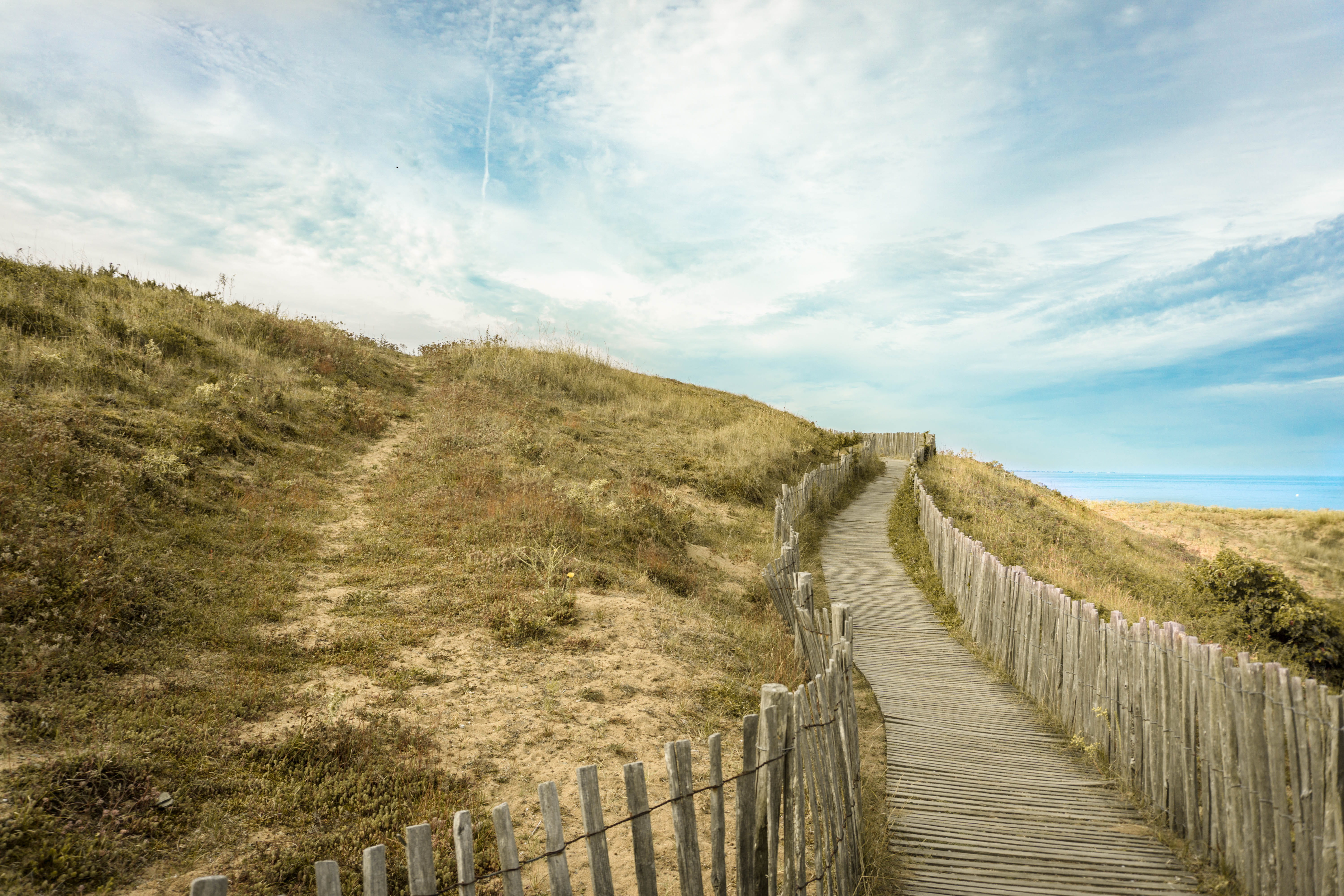 outdoors, fence, fences, land, 5K, hillside, gray, environment, boundary, seaside, sky, grass, plant, bridge, tranquility, path, plage de létang, scenics - nature, HD Wallpaper