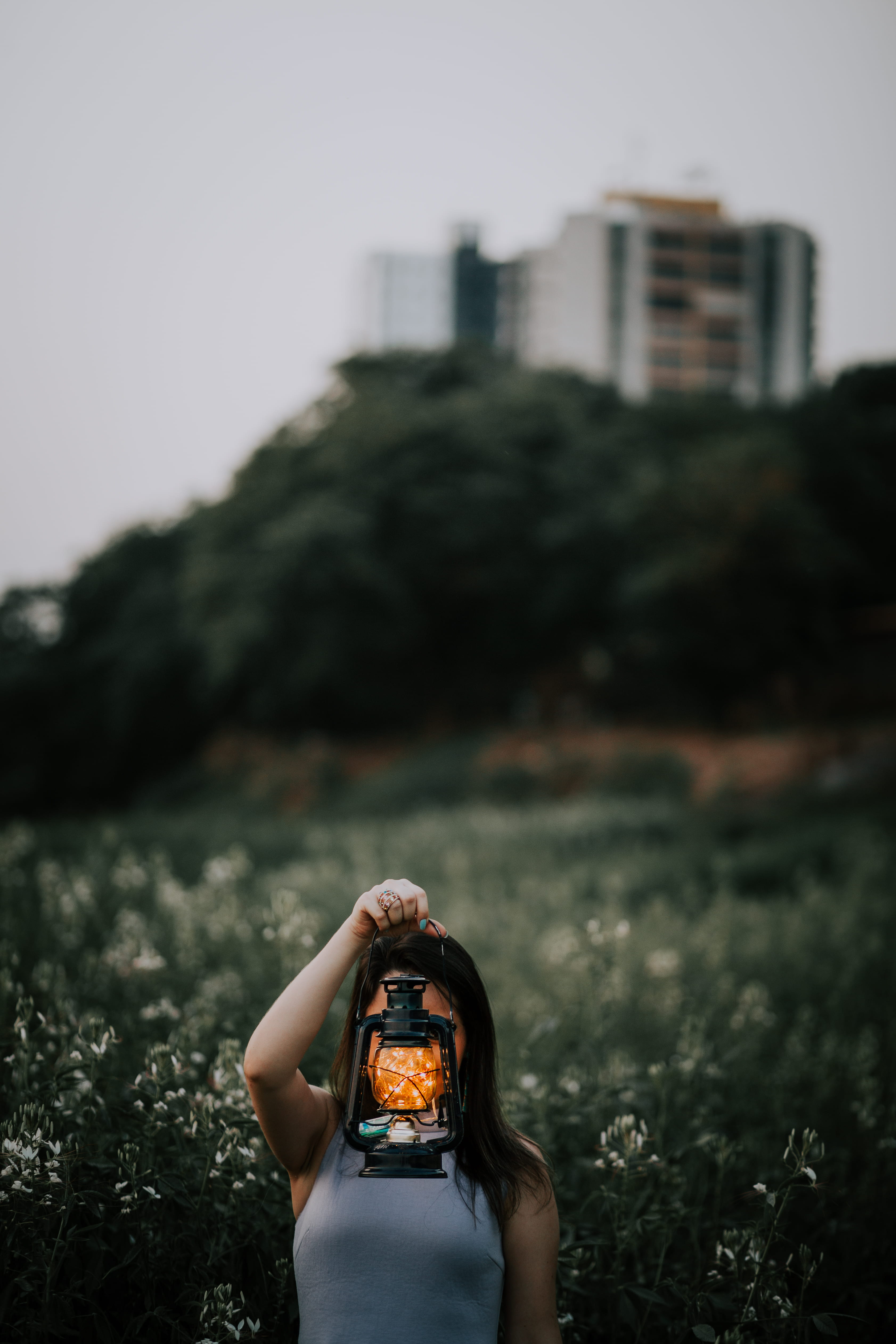 female, women, orange, adult, lantern, day, outdoors, hillside, lifestyles, woman, architecture, holding, focus, focus on foreground, light, photography, Phone HD Wallpaper