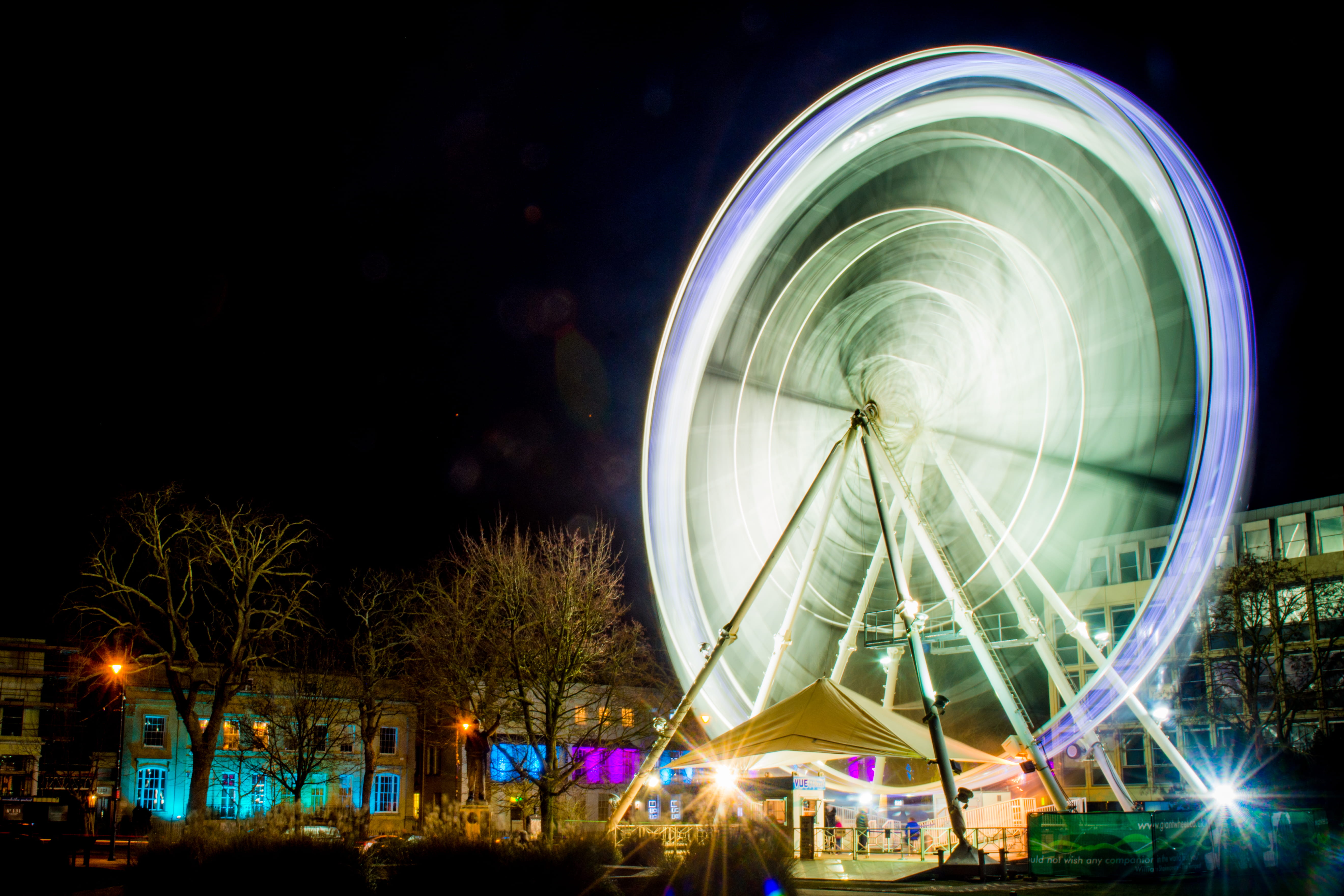 illuminated, carousel, glowing, Cheltenham, flare, city, long exposure, person, light, human, tarmac, built structure, lighting, Lights Timelapse, amusement park ride, HD Wallpaper