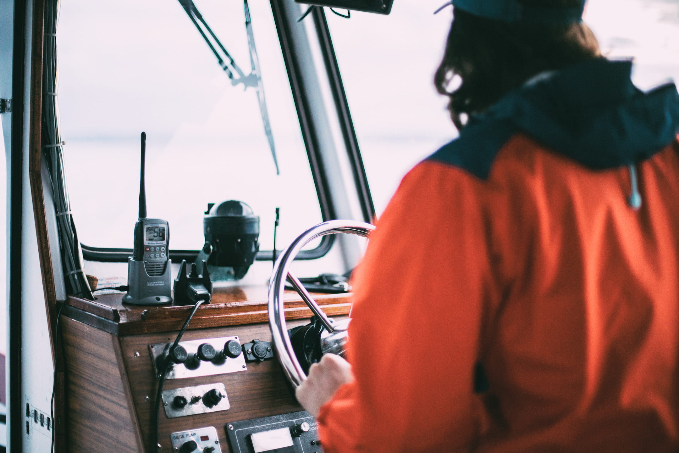 rear view, boat, transportation, walkie-talkie, uniform, selective focus, adult, occupation, real people, sailor, working, boat captain, guy, direction, HD Wallpaper
