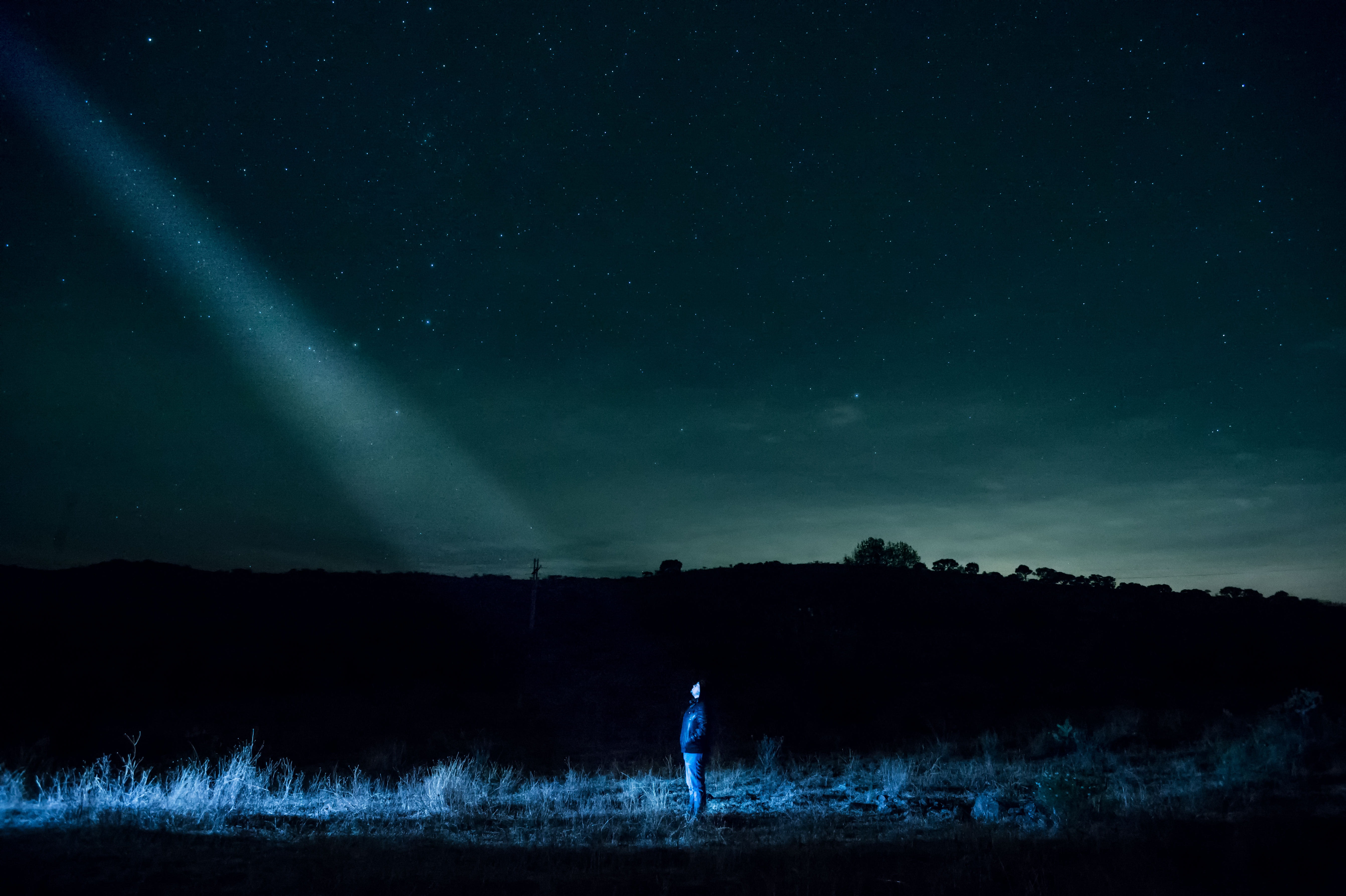 one person, standing, star, spot, astronomy, tranquility, light, stars, tranquil scene, nature, star - space, alleyway, field, environment, milky way, beauty in nature, HD Wallpaper
