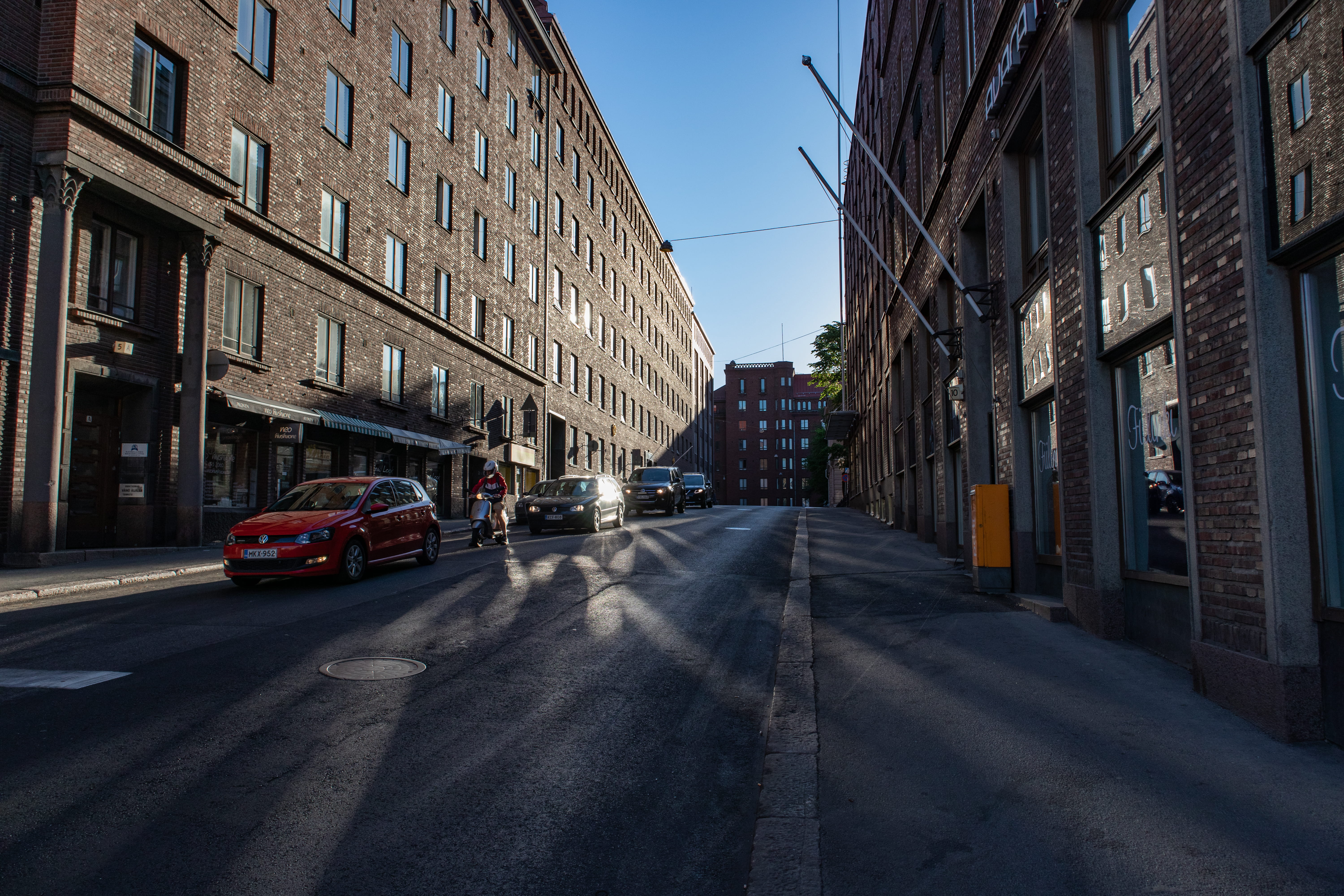 urban, direction, red, machine, 5K, sky, human, tarmac, building, transportation, clear, motorcycle, street, incidental people, behind, building exterior, HD Wallpaper