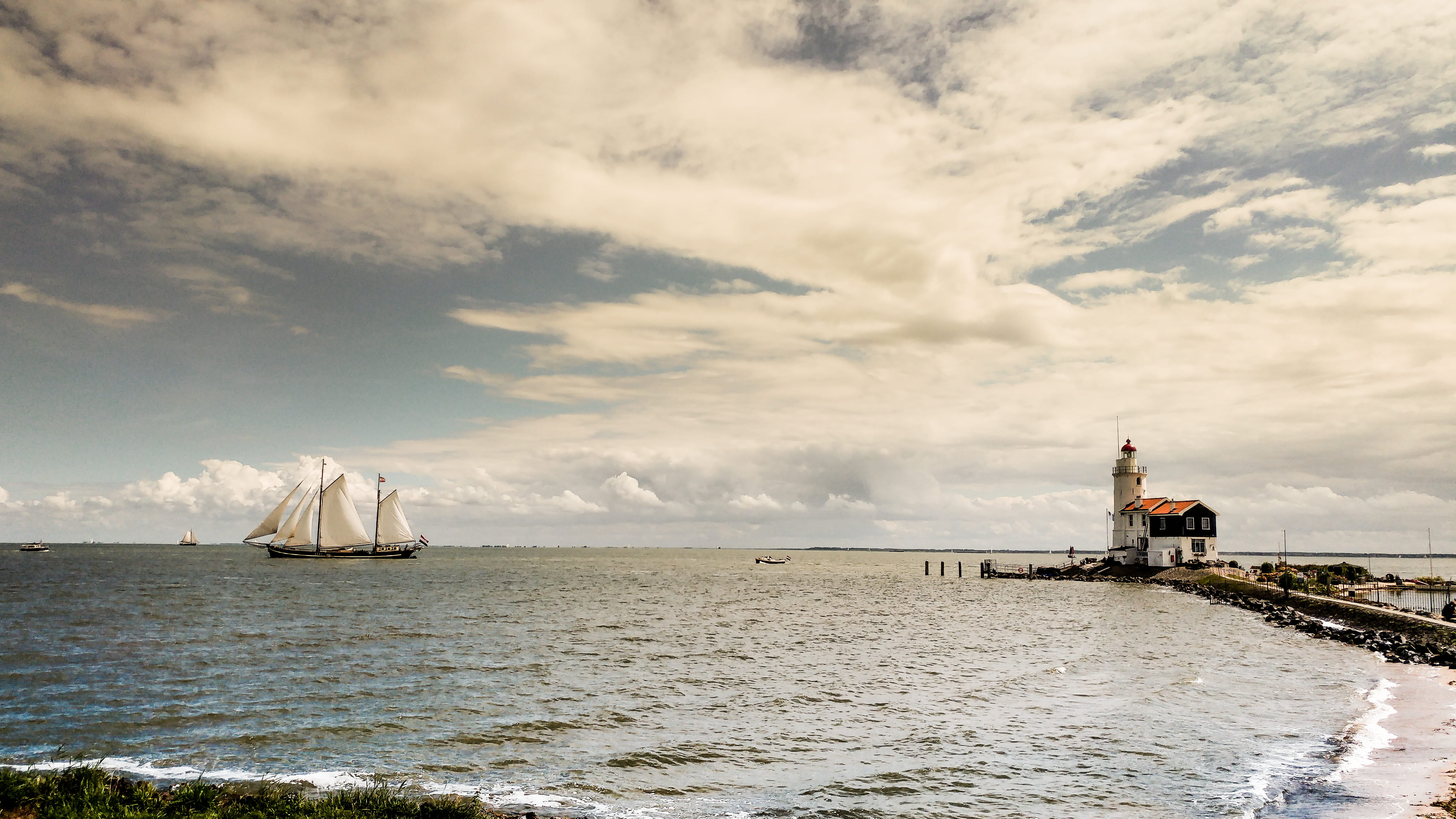 waterfront, scenics - nature, 4K, netherlands, beauty in nature, horizon over water, safety, land, protection, pier, ship, built structure, sky, lighthouse, HD Wallpaper