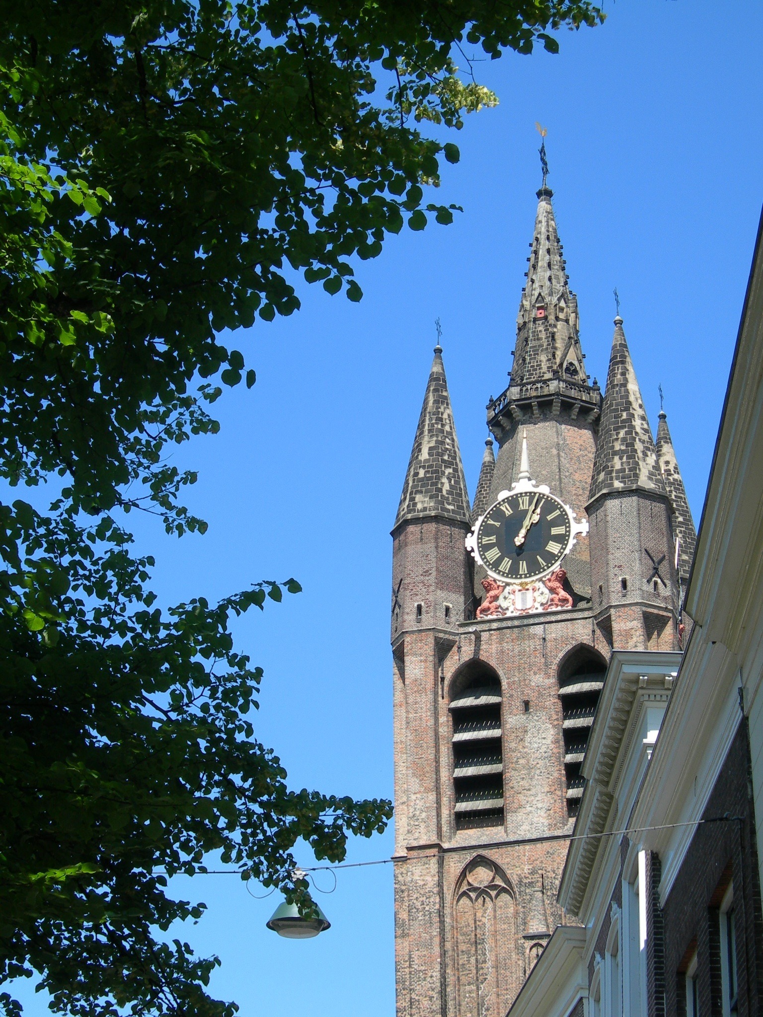 sky, buildings, gothic Style, no people, famous Place, street, spirituality, clear sky, day, delft, religion, clock tower, nature, plant, place of worship, Phone HD Wallpaper