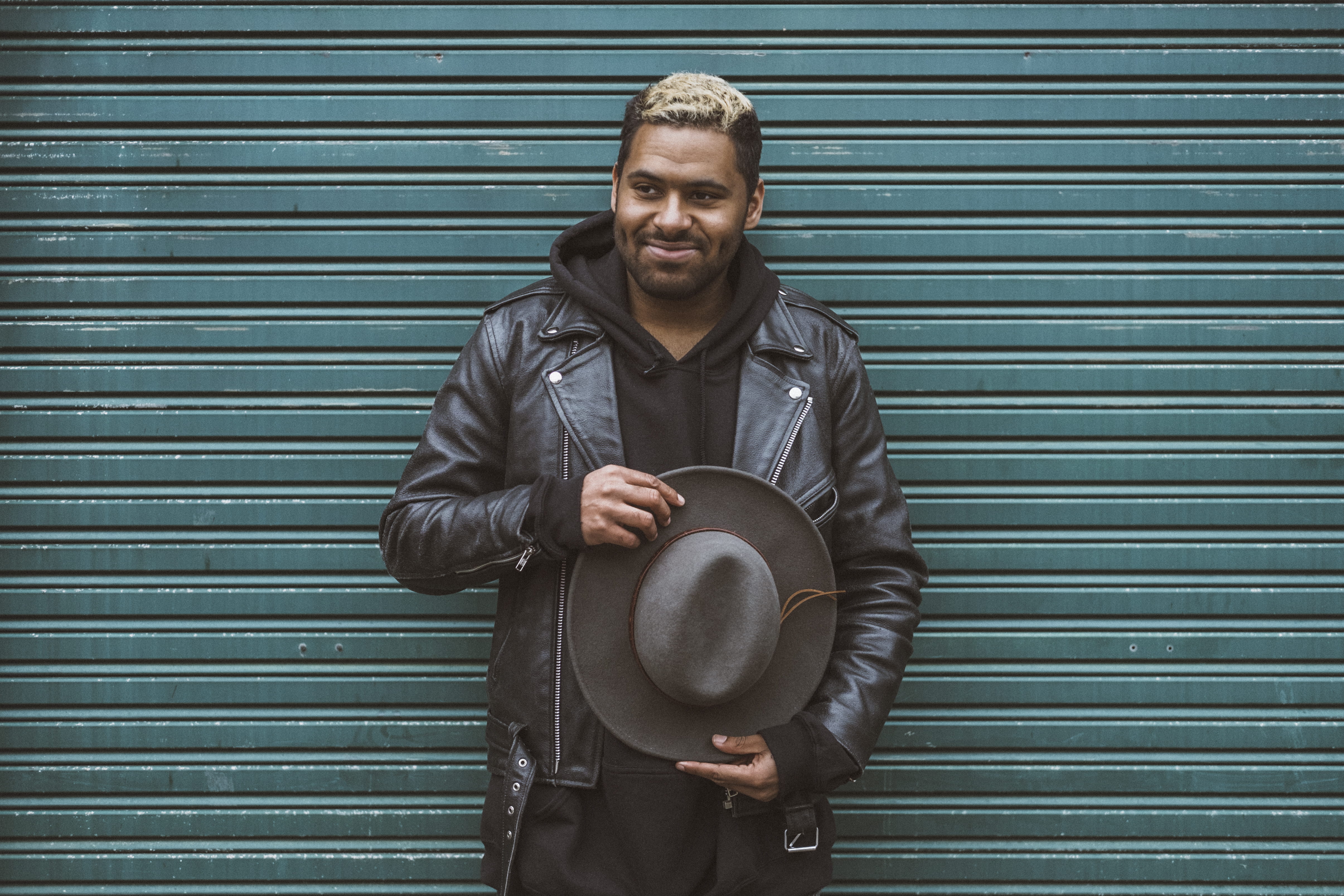 4K, one person, architecture, hold, guy, lifestyles, real people, garage door, hat, diverse, front view, adult, iron, facial hair, standing, style, shutter, HD Wallpaper
