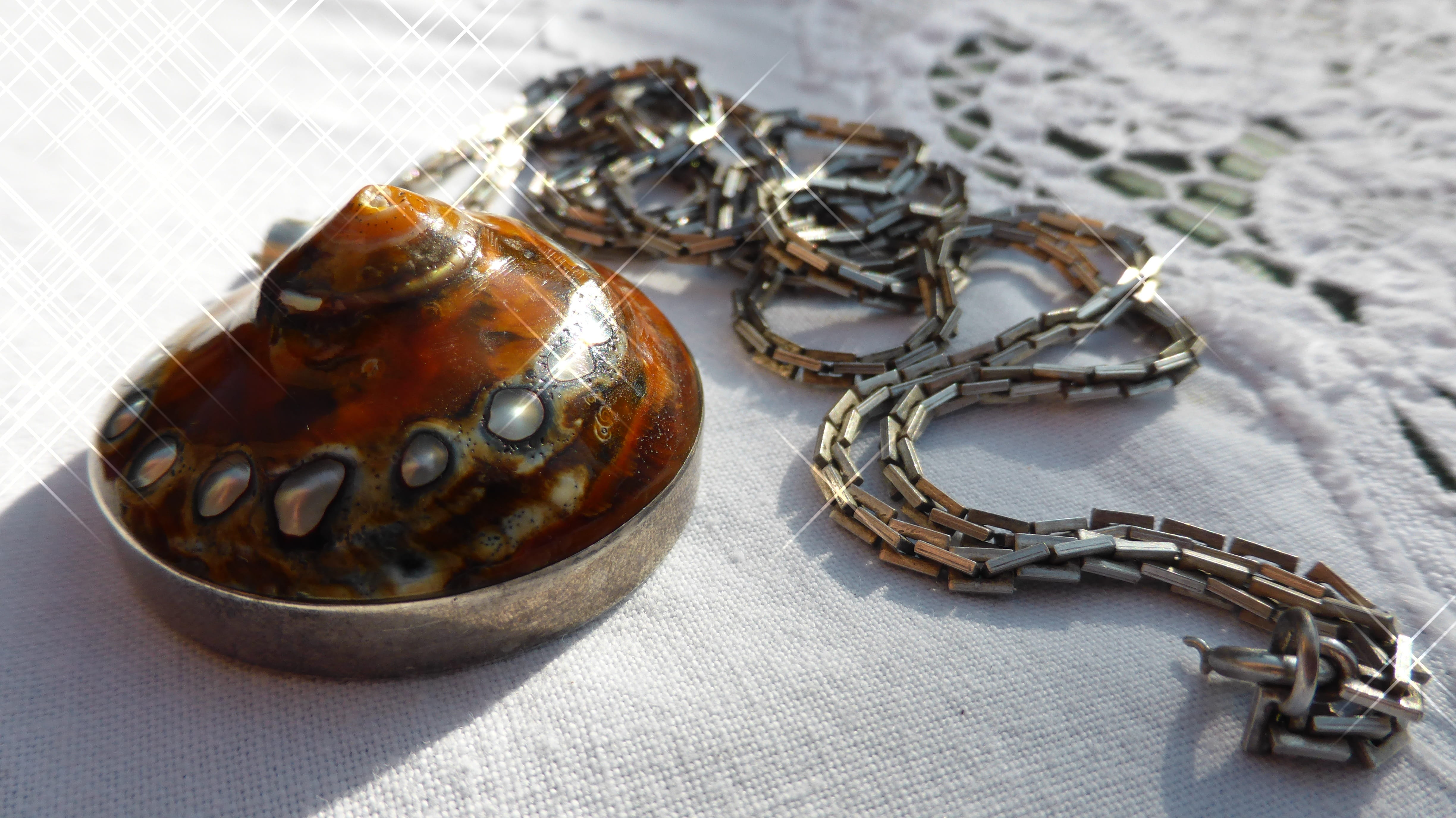 chain, bracelet, focus on foreground, security, jewellery, tablecloth, snail, protection, religion, no people, fashion, close-up, still life, safety, belief, HD Wallpaper