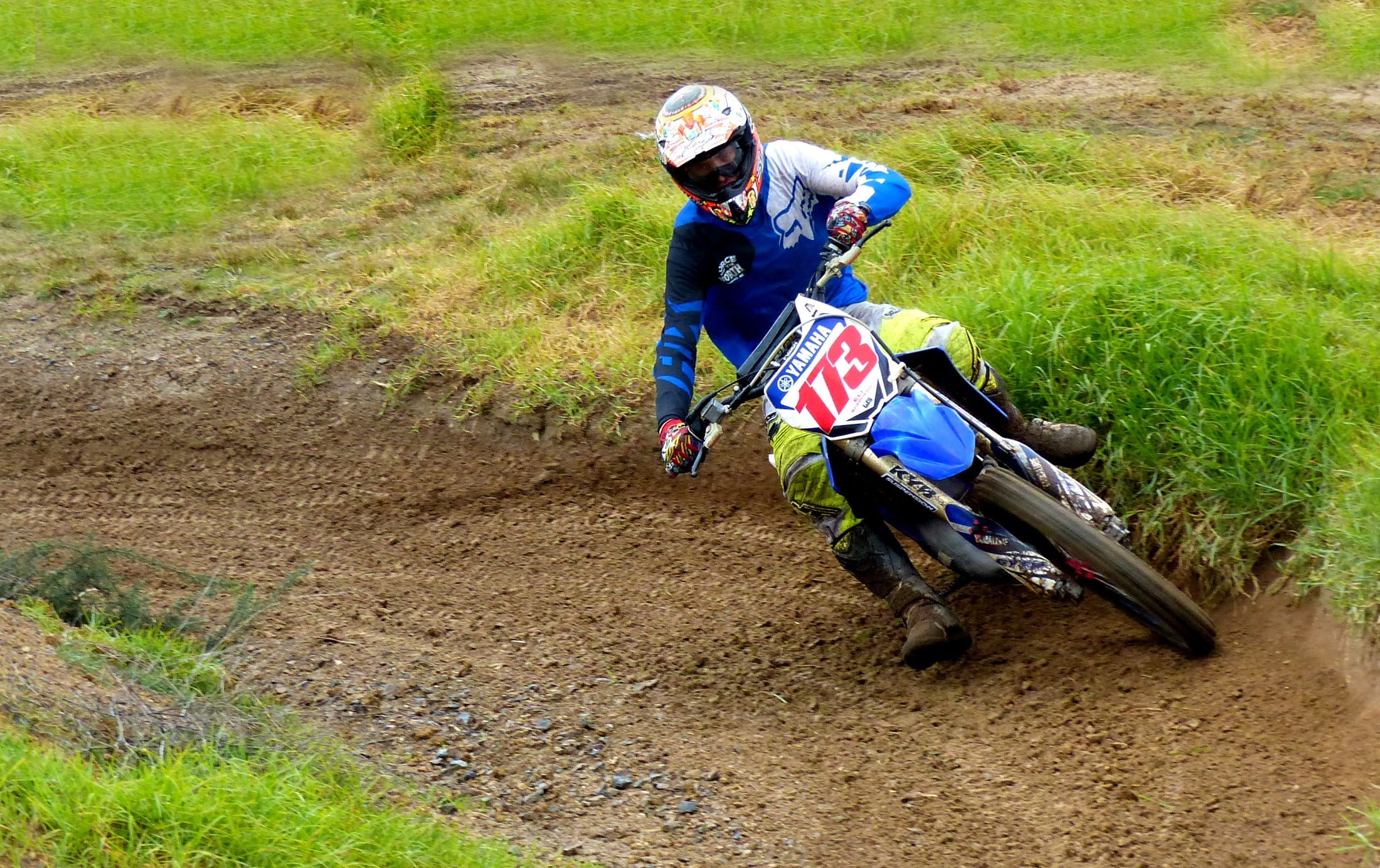 action, grass, riding, sport, front view, speed, crash helmet, day, dangerous, motion, motorcross, child, dirt, cycle, helmet, leisure activity, outdoors, HD Wallpaper