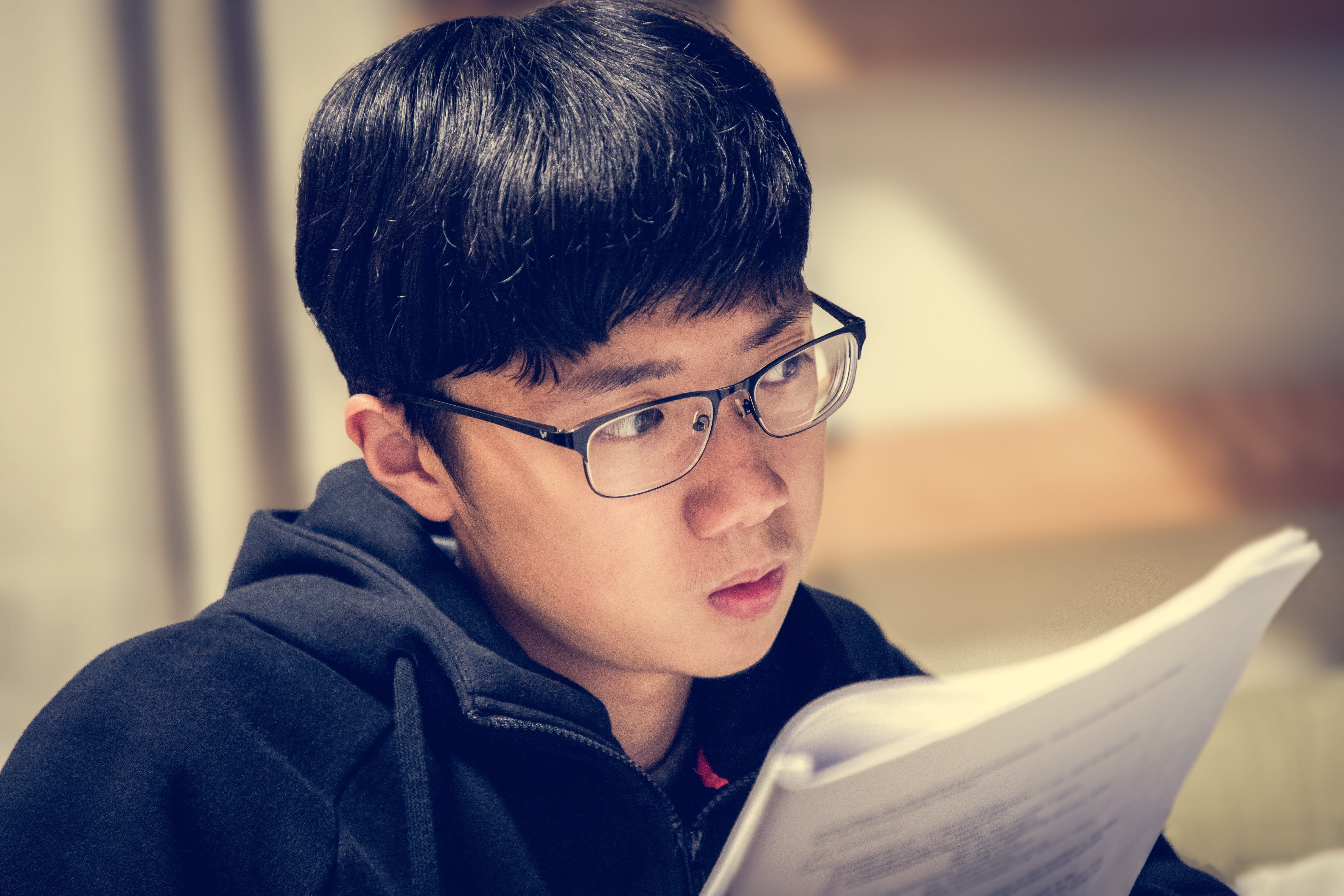 one person, writing, college, real people, asian, child, lifestyles, thinking, focus on foreground, book, males, teenager, soft light, scholar, focus, coding, HD Wallpaper