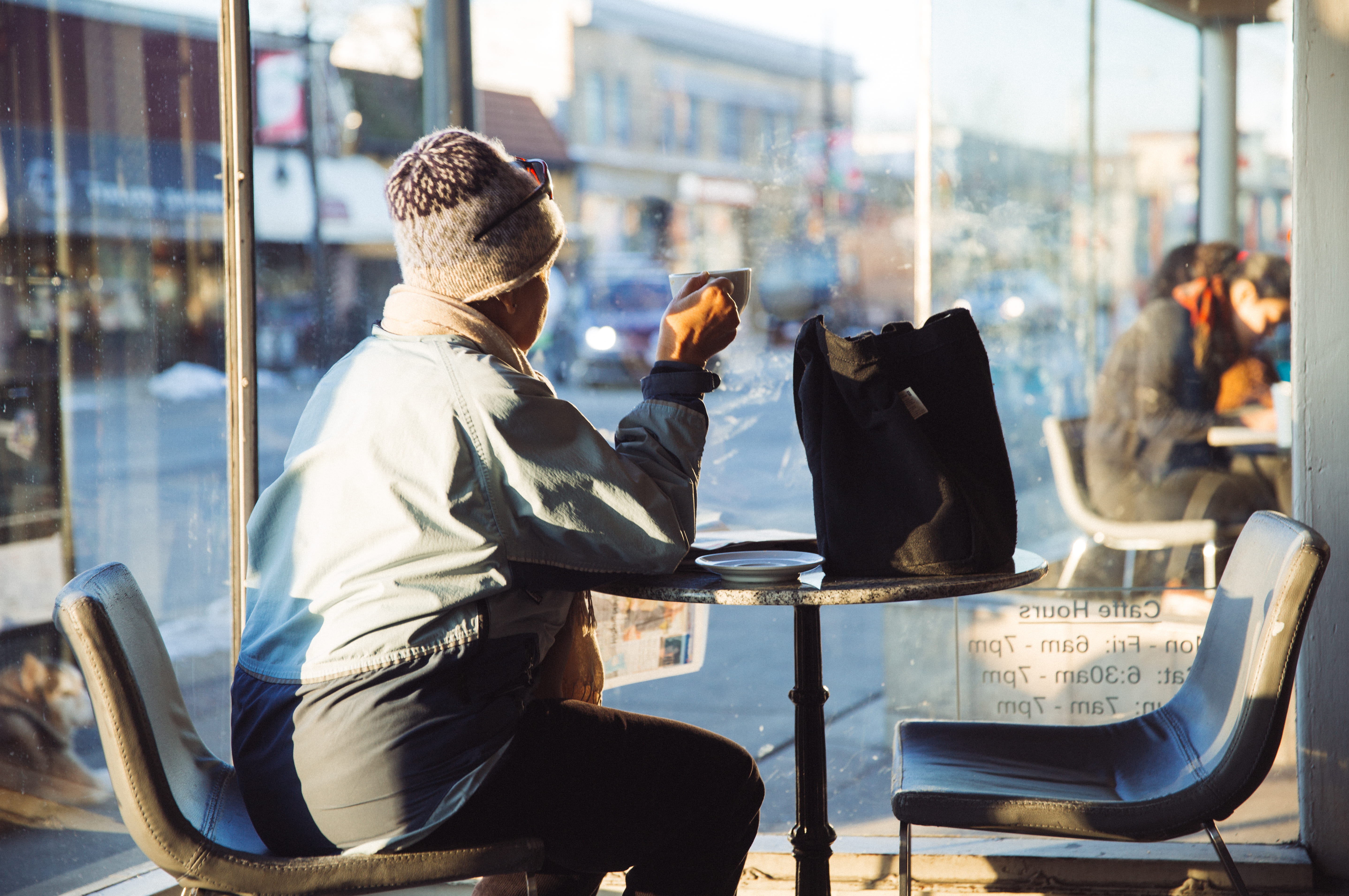 holding, architecture, coat, table, transportation, coffee, interior, inside, woman, reflection, one person, rear view, city, bag, seat, jacket, sitting, HD Wallpaper