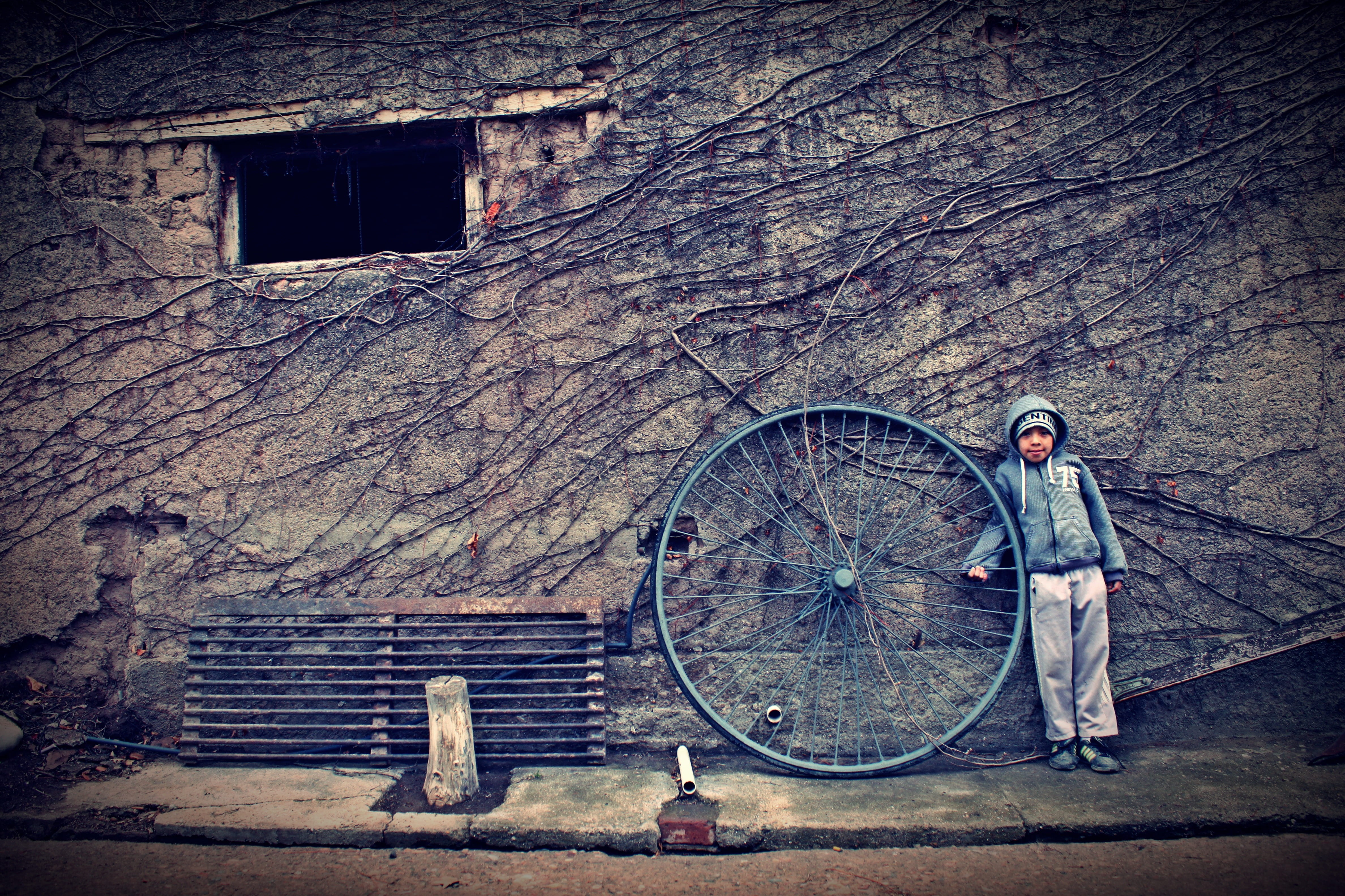 child, spoke, wall, real people, outdoors, leaned, transportation, wheel, full length, damaged, 4K, day, architecture, wall - building feature, hoodie, HD Wallpaper