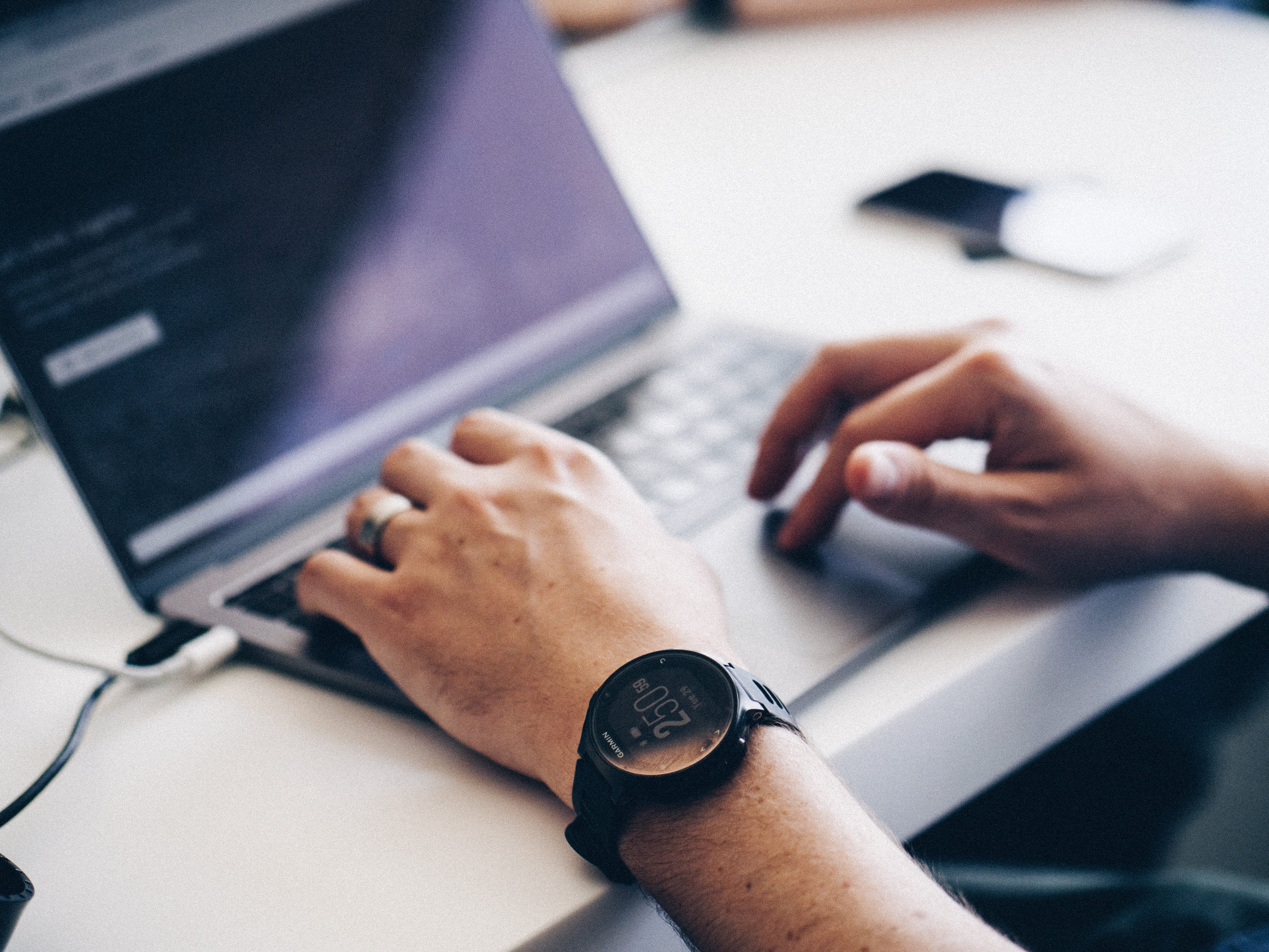 photography, close-up, man, computer equipment, working, human hand, focus, laptop, adult, macbook, wireless technology, 5K, indoors, white, office, key, HD Wallpaper