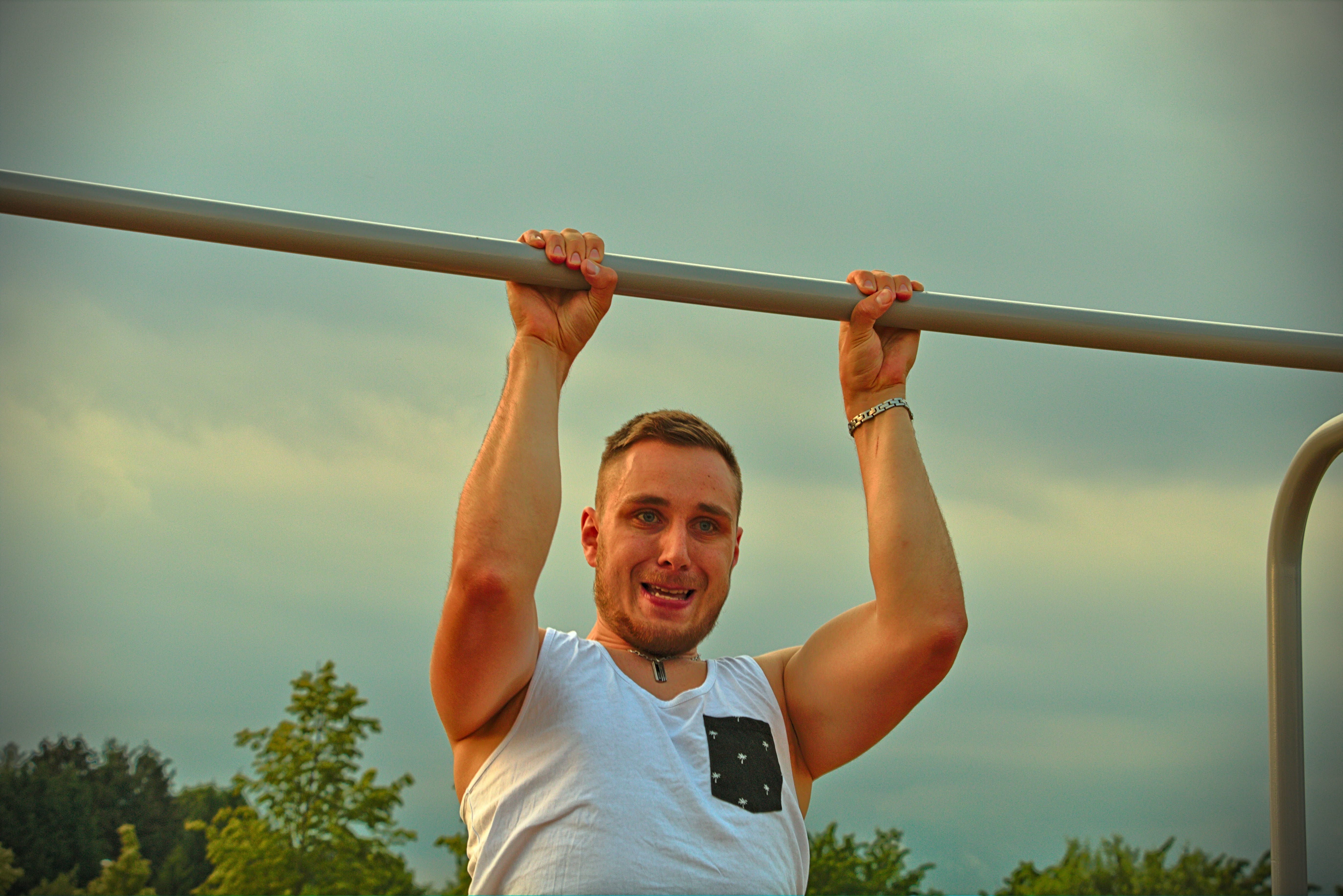 bodybuilder, nature, athlete, strength, adult, men, real people, athletic, evening, pull ups, body, tree, lifestyles, human arm, monkey bars, healthy, workout, HD Wallpaper