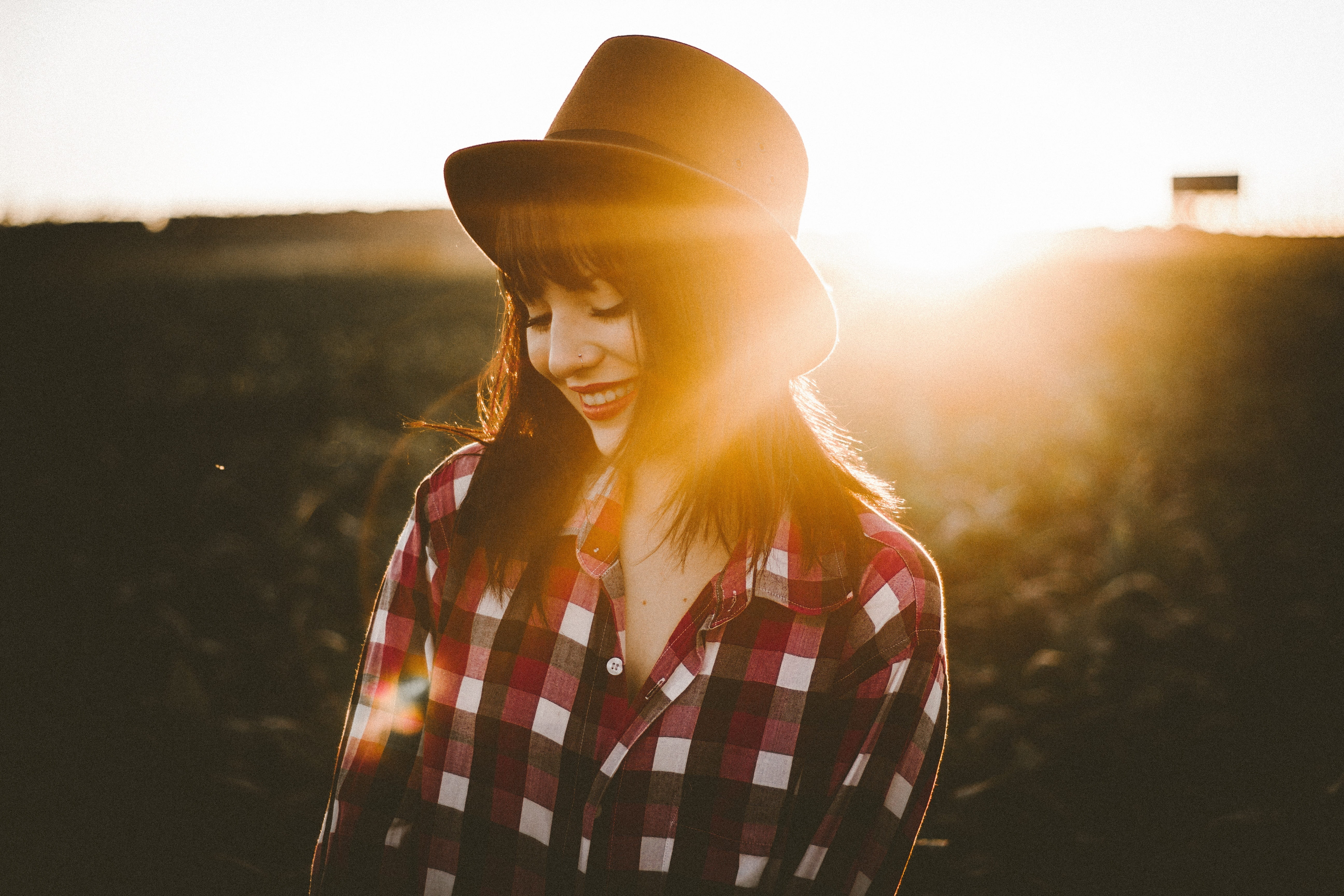 sunlight, teenager, fedora, adult, hairstyle, button, one person, female, lens flare, happiness, girl, sunset, sunshine, young adult, hair, beauty, shirt, HD Wallpaper
