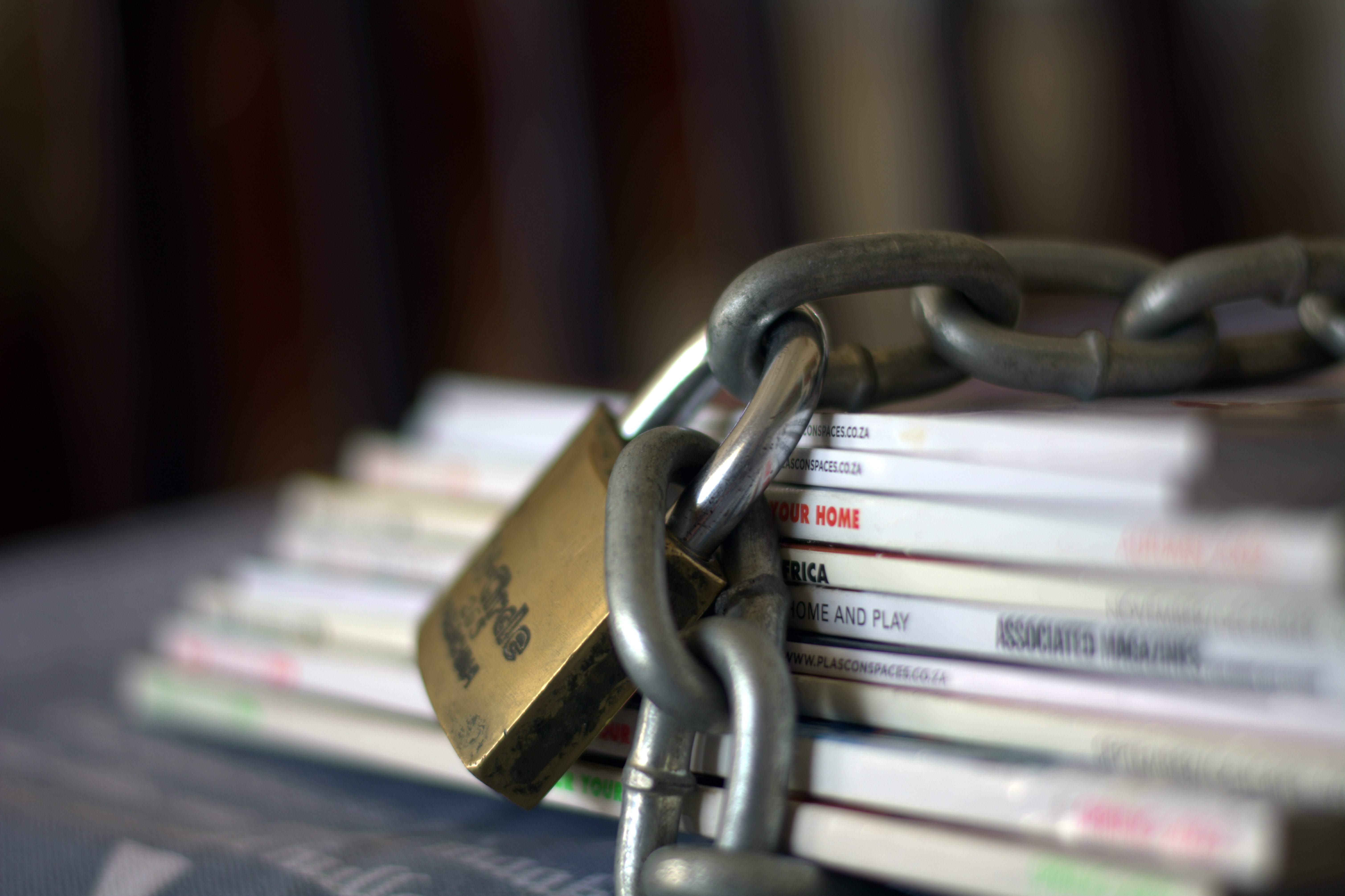 selective focus, architecture, safety, chained magazines, lock, religious equipment, business, metal, indoors, text, chain, communication, safe, protection, HD Wallpaper