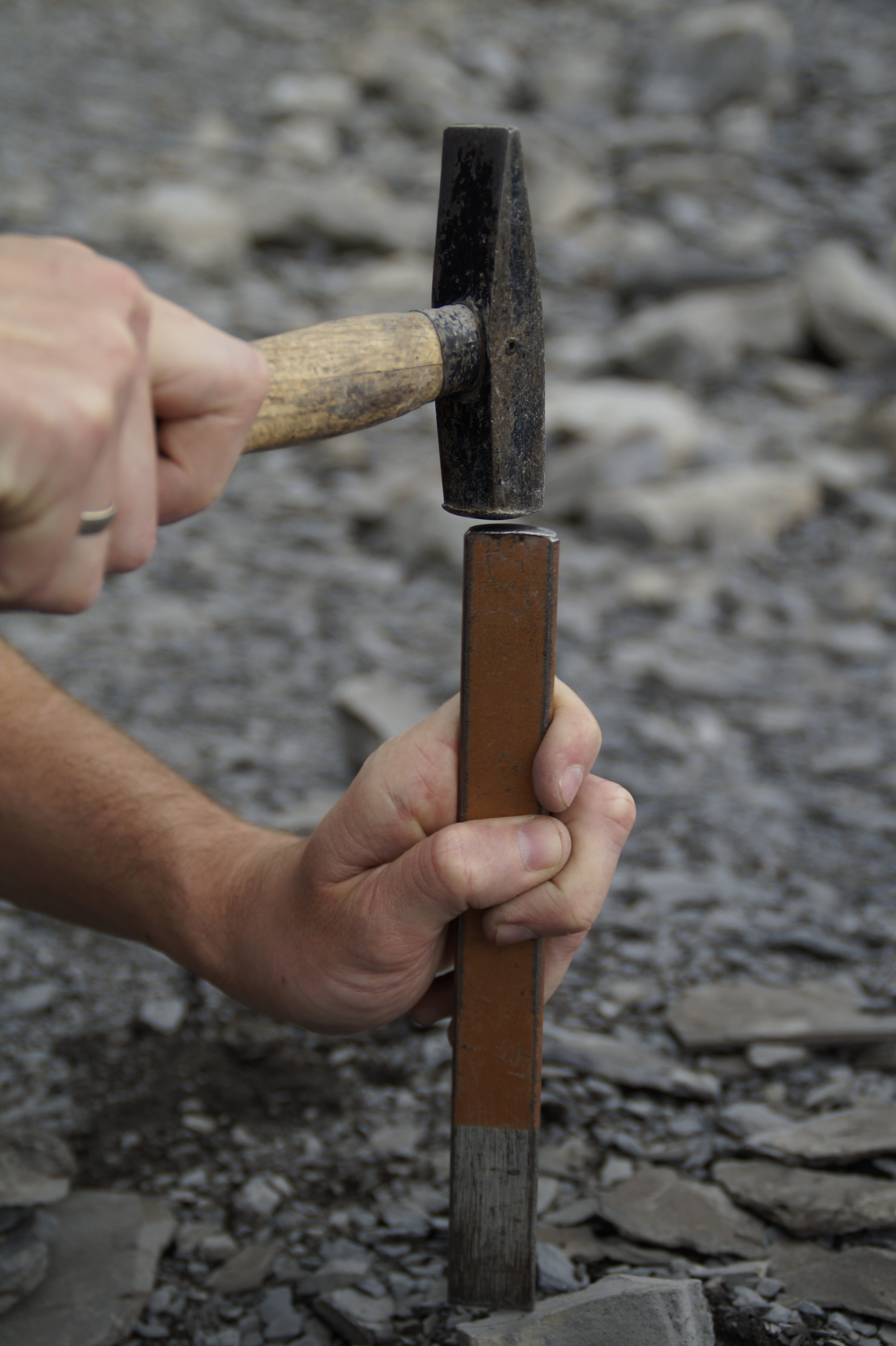 close-up, focus on foreground, knocking stones, tool, paleontology, search for fossils, finger, chisel, outdoors, lifestyles, human finger, human hand, Phone HD Wallpaper