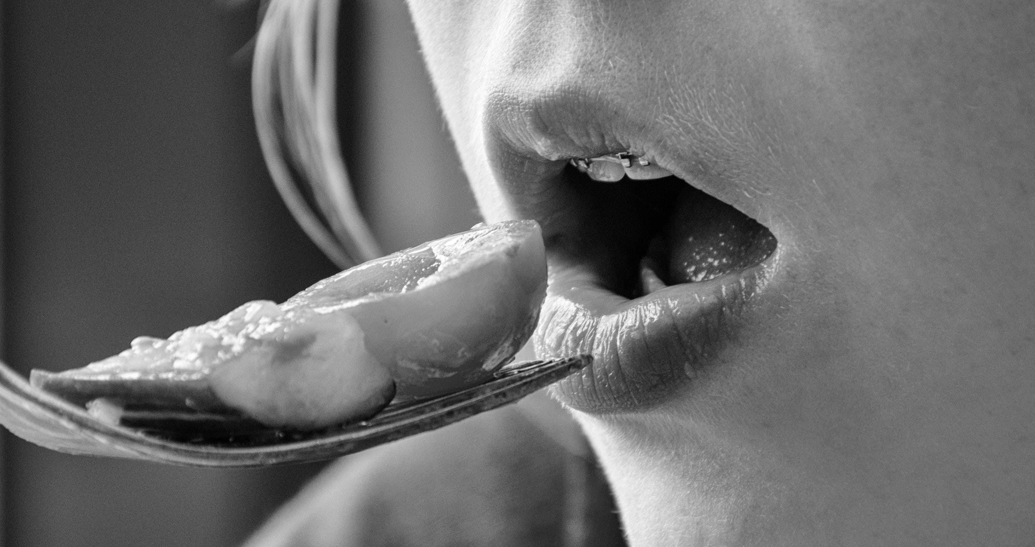 profile view, photography, indoors, human face, people, black and white, black white, hunger, adults only, lifestyles, lips, cutlery, grayscale, focus on foreground, HD Wallpaper