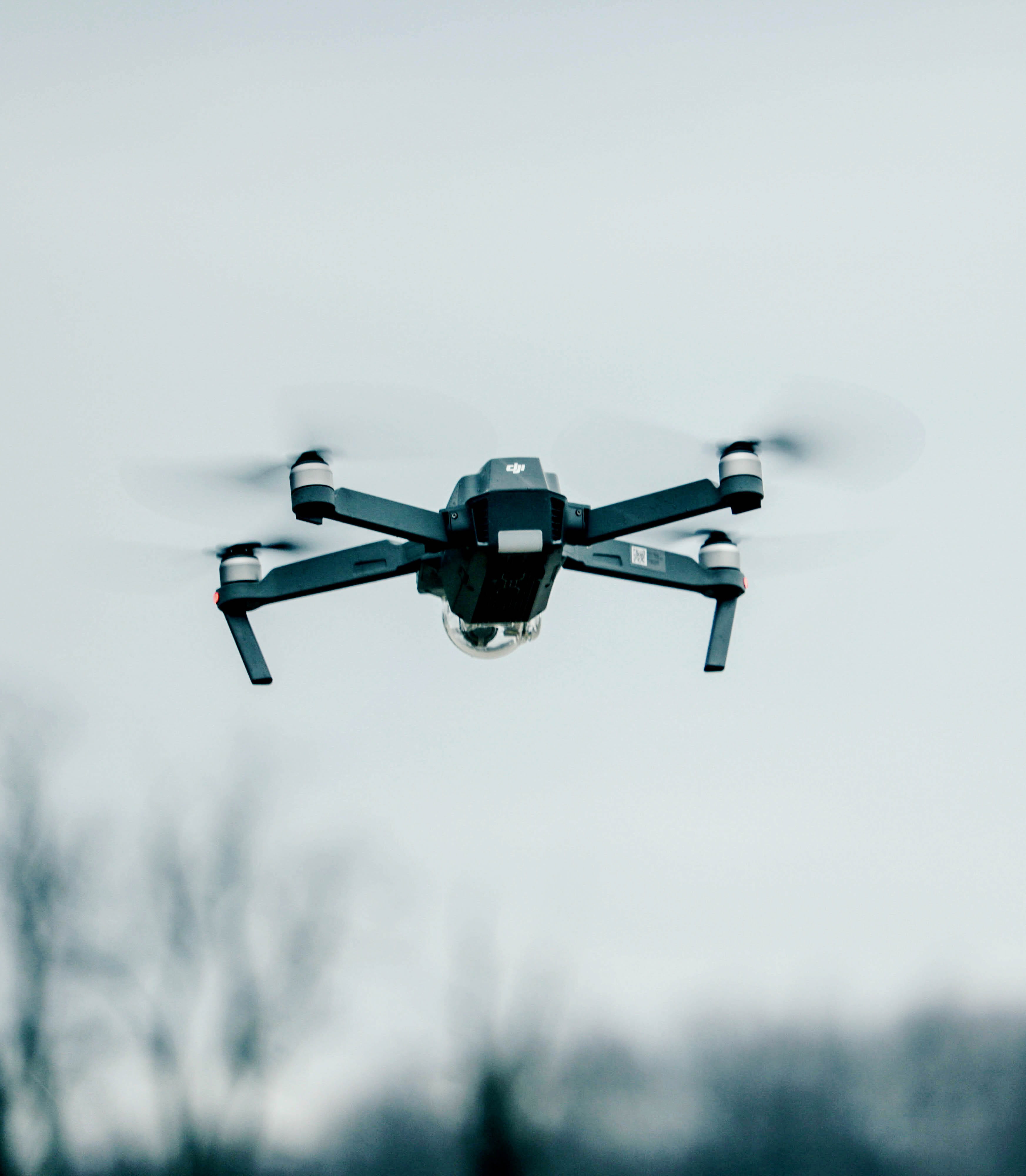 motion, hover, low angle view, mavic, black, no people, aerospace industry, outdoors, blurred motion, equipment, air vehicle, drone, tree, airplane, quadcopter, Phone HD Wallpaper