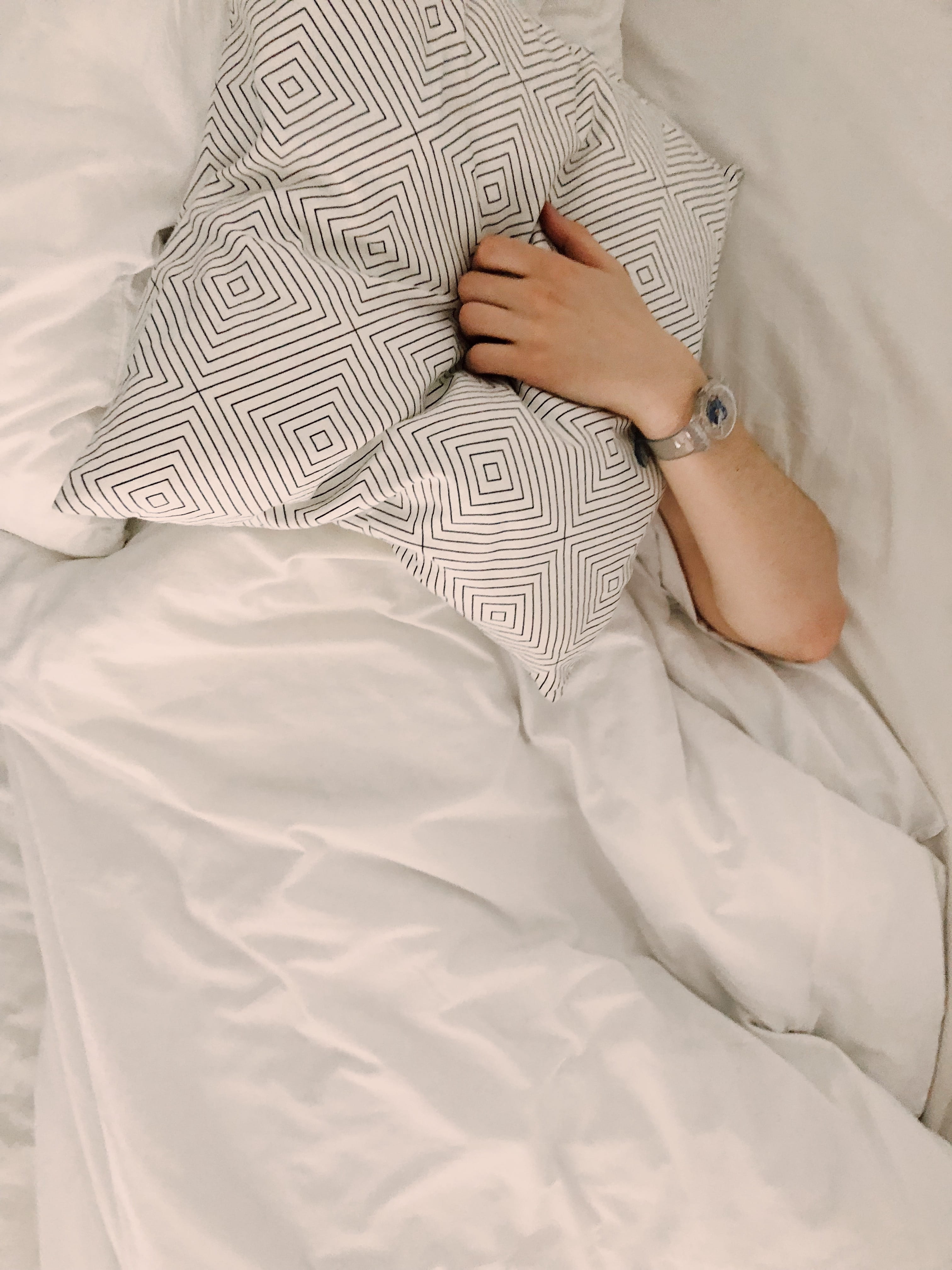 relaxation, bedroom, blanket, hand, one person, body part, lying down, high angle view, lifestyles, women, furniture, holding, gray, throw, human body part, Phone HD Wallpaper