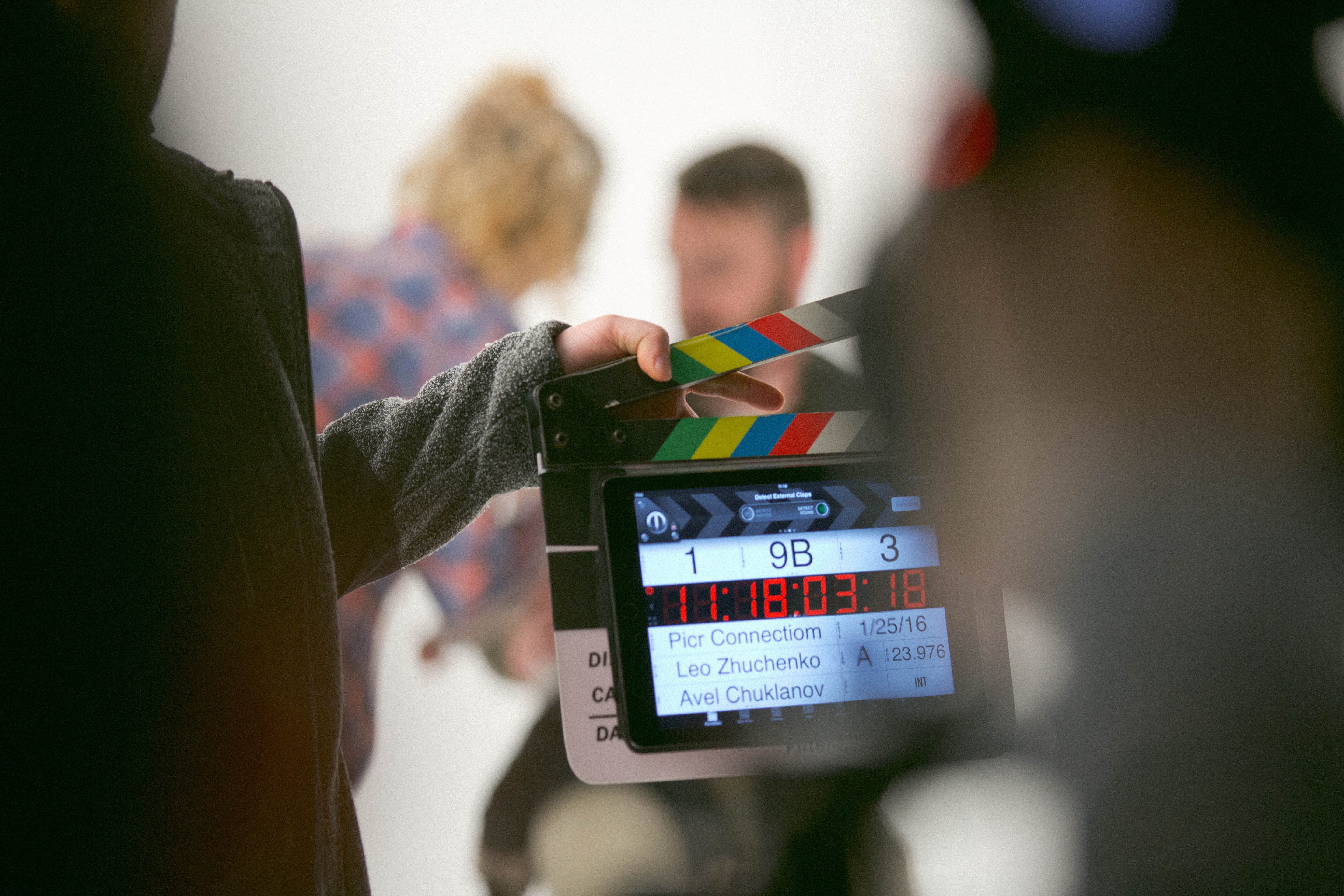 adult, holding, clapper, 5K, black, males, close-up, looking, movie, computer, connection, film, photography, person, headshot, wireless technology, indoors, HD Wallpaper
