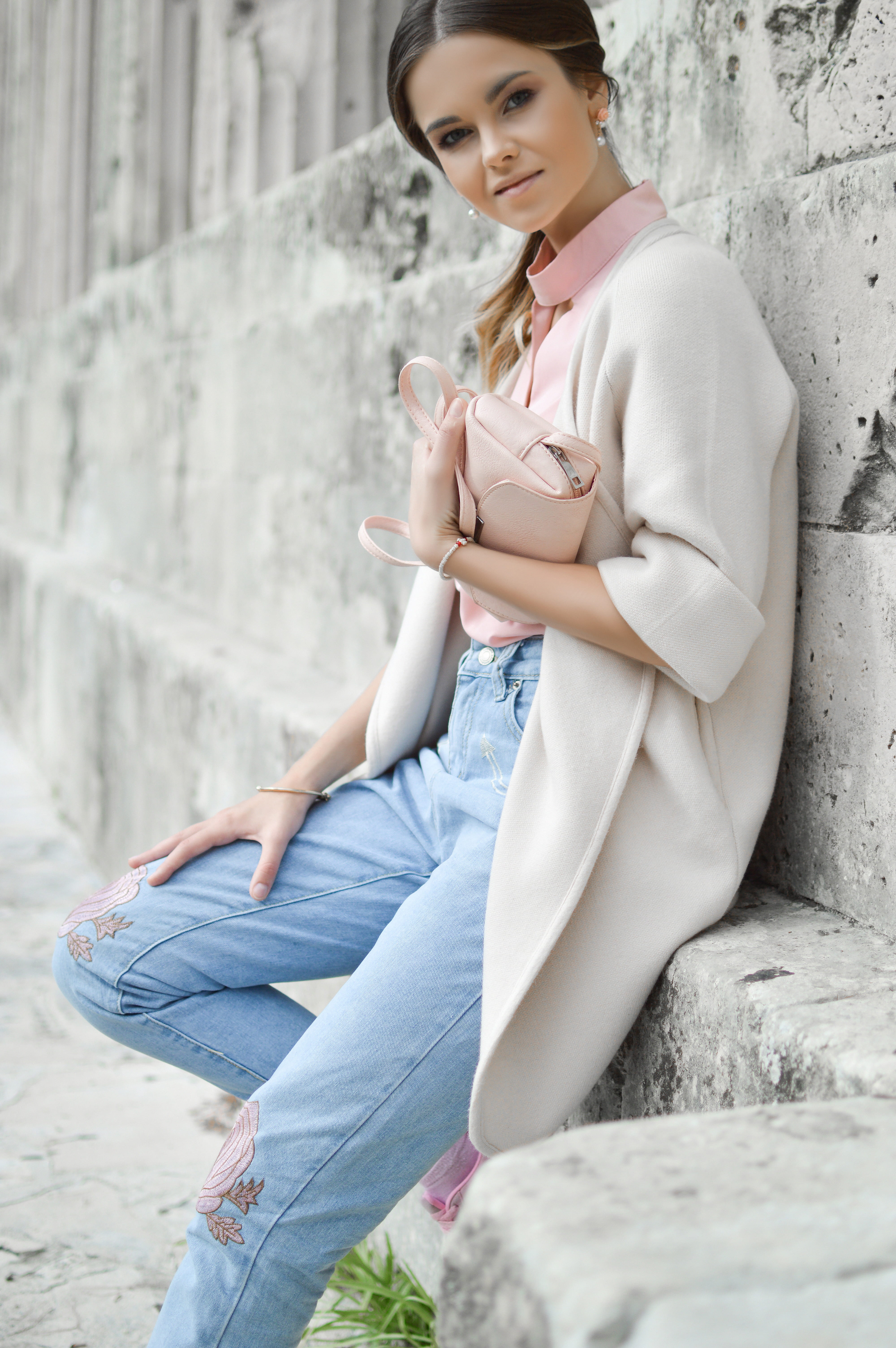 gray, denim, sitting, 5K, hairstyle, real people, fashion, looking at camera, leaning against wall, lifestyles, daytime, wearing, leisure activity, adult, Phone HD Wallpaper