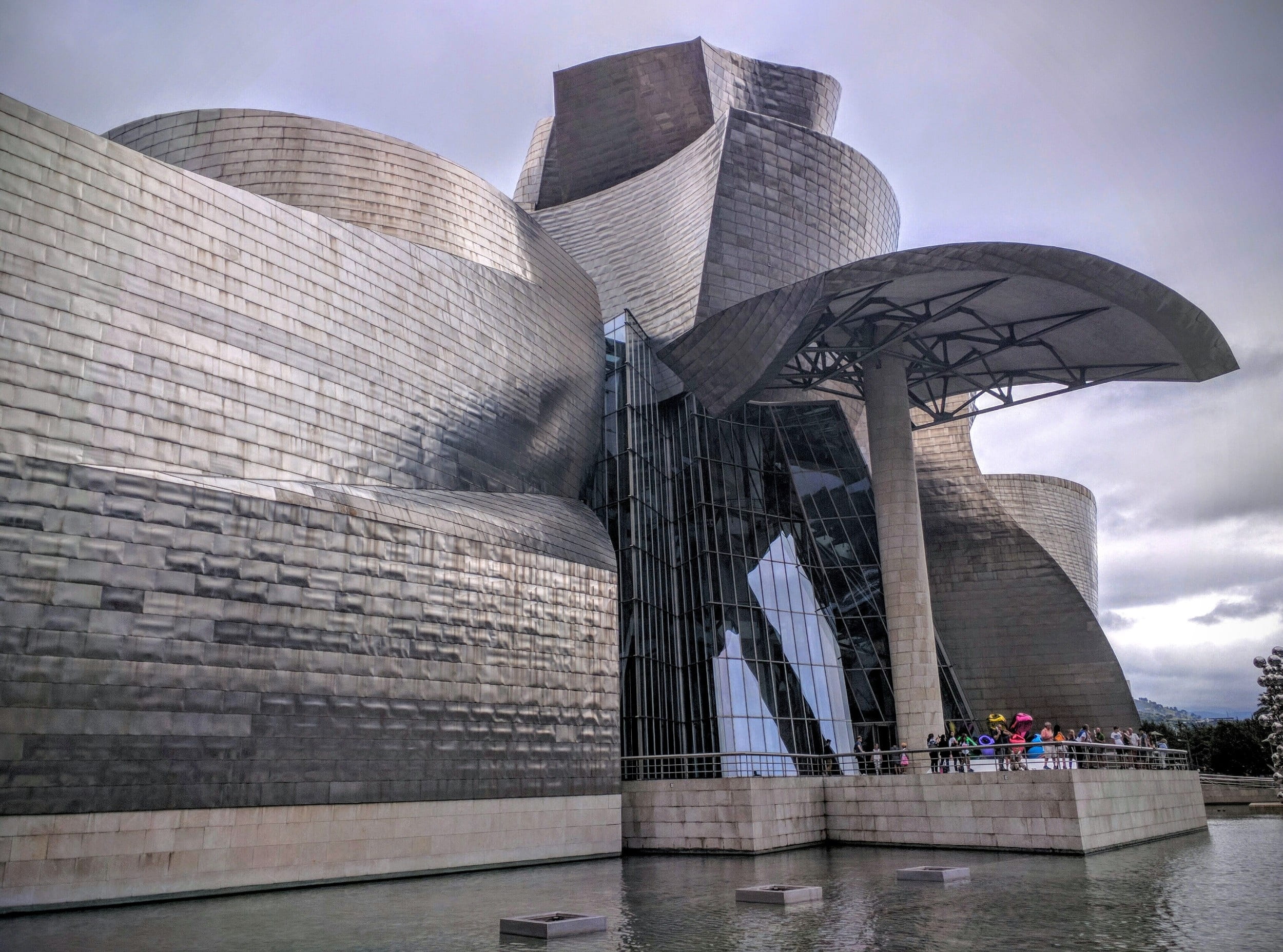 skyscraper, travel destinations, reflection, building, sky, water, city, day, bilbao, built structure, futuristic, 1080P, museum, modern, tourism, building exterior, HD Wallpaper