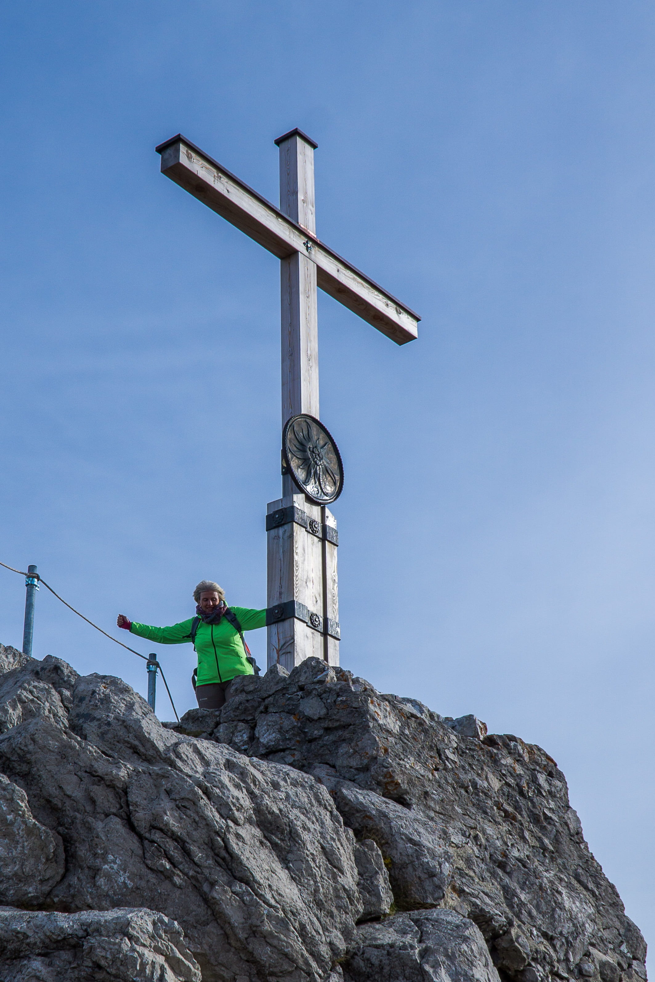 one person, sunlight, day, woman, clear sky, blue, 2K, human, men, allgäu, rock - object, sky, mountains, sun, front view, summit, cross, real people, Phone HD Wallpaper