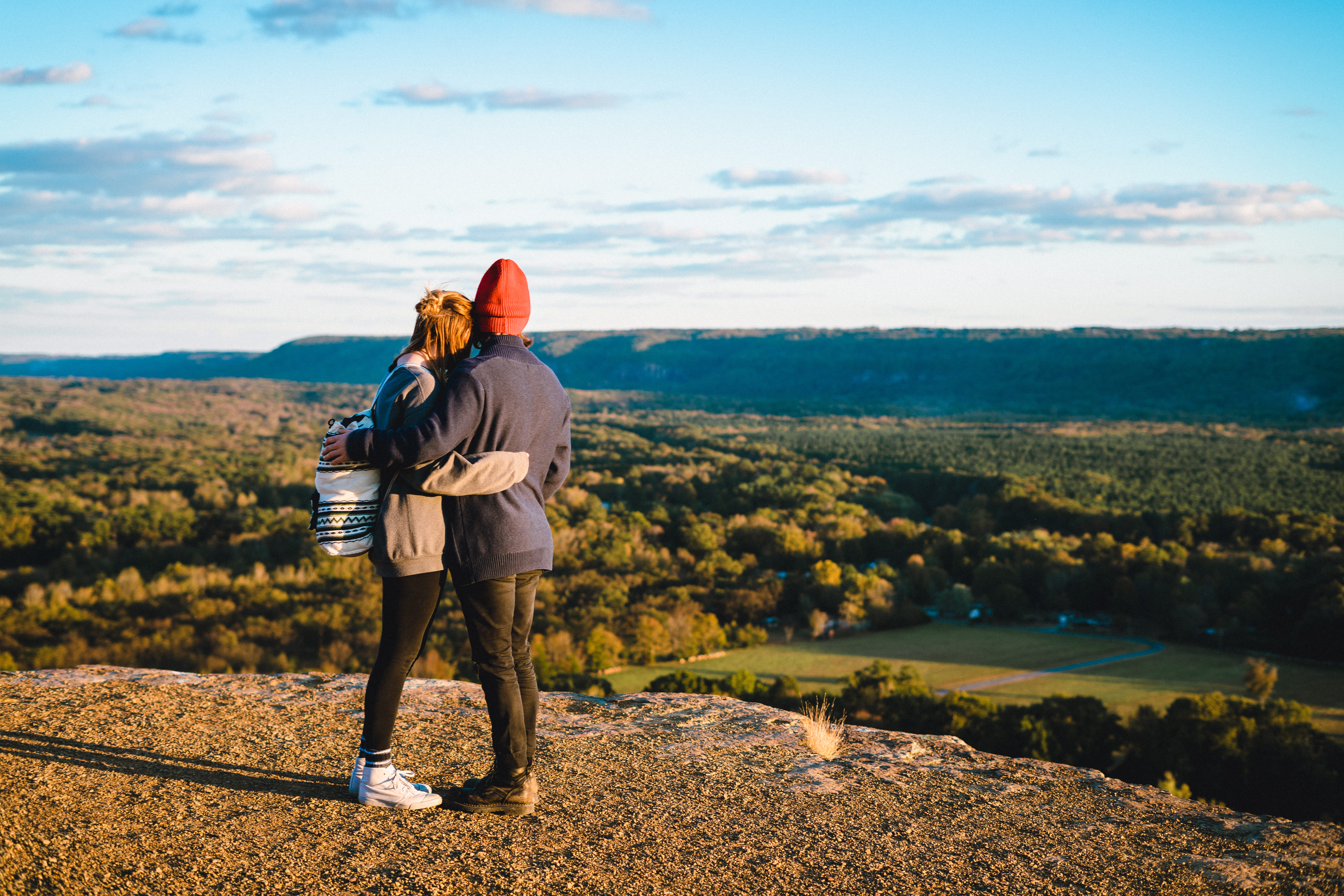 outdoor, hugging, man, couple, rear view, standing, front, couple - relationship, people, outdoors, two people, real people, day, trees, casual clothing, HD Wallpaper