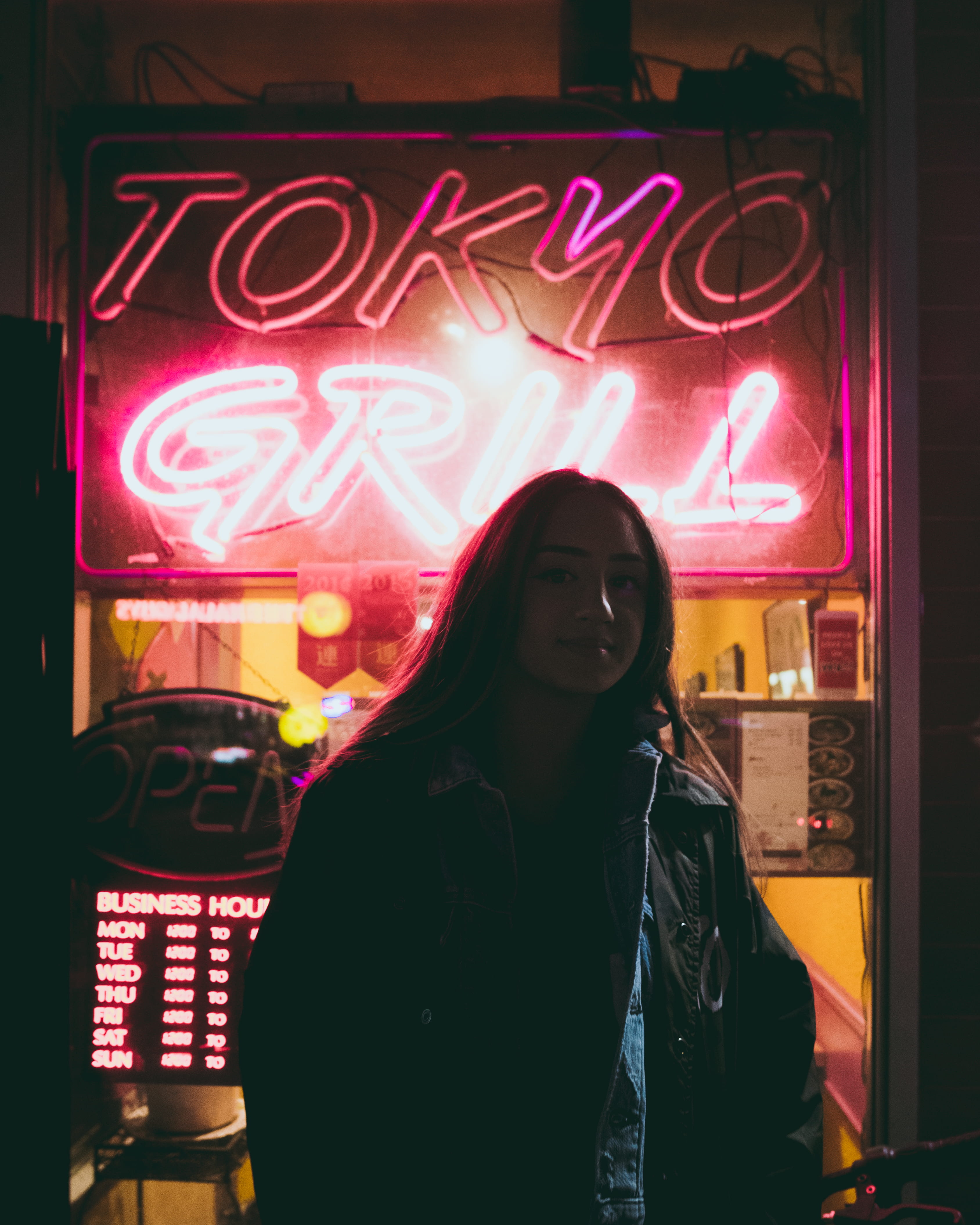 women, front, 4K, night, waist up, text, front view, black, real people, leisure activity, hood - clothing, grill, indoors, neon, warm clothing, lifestyles, Phone HD Wallpaper
