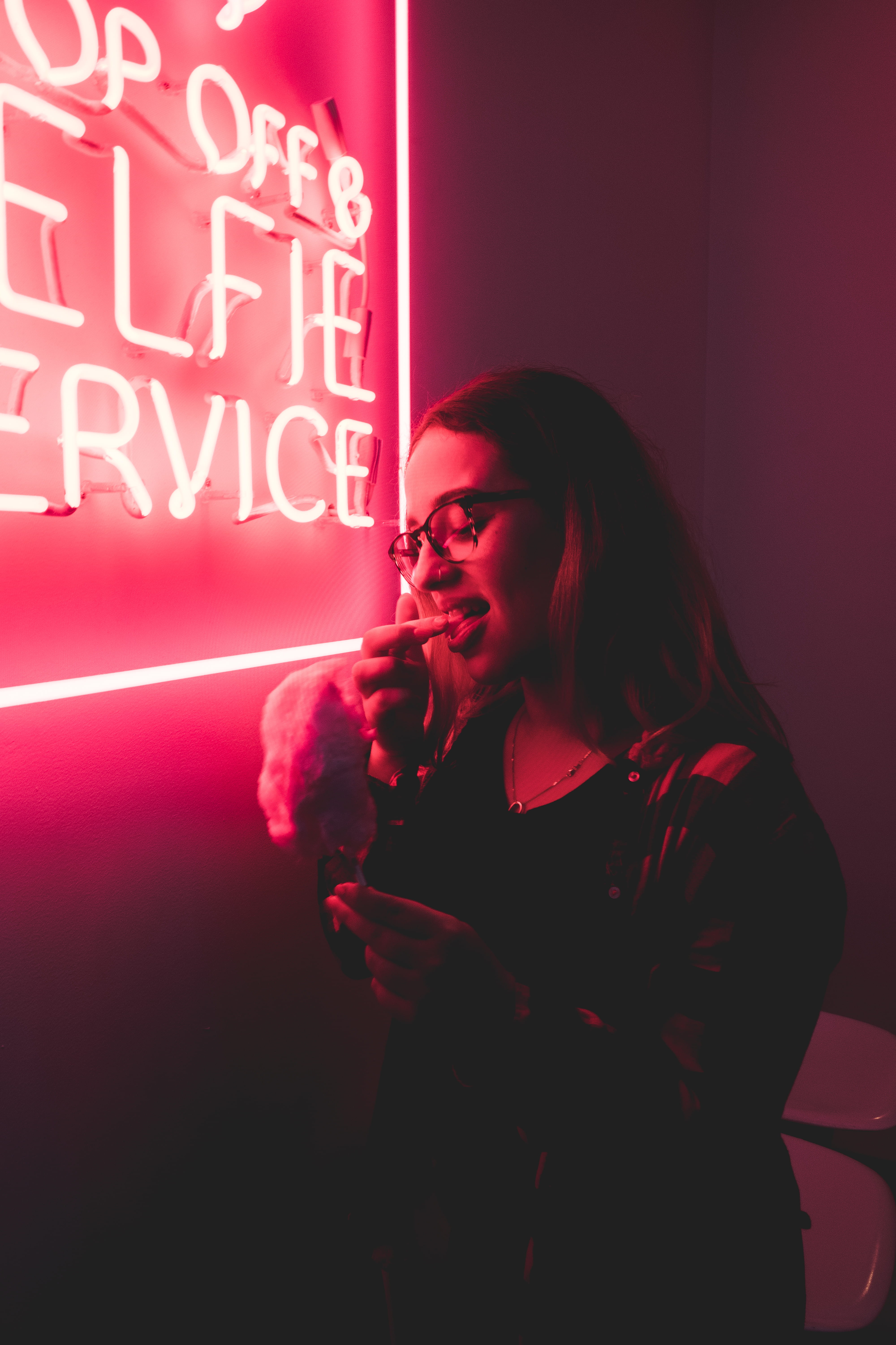 glasses, cream, cotton candy, adult, neck, one person, brunette, nightlife, dream, portrait, hairstyle, holding, lifestyles, young, real people, eat, neon light, Phone HD Wallpaper