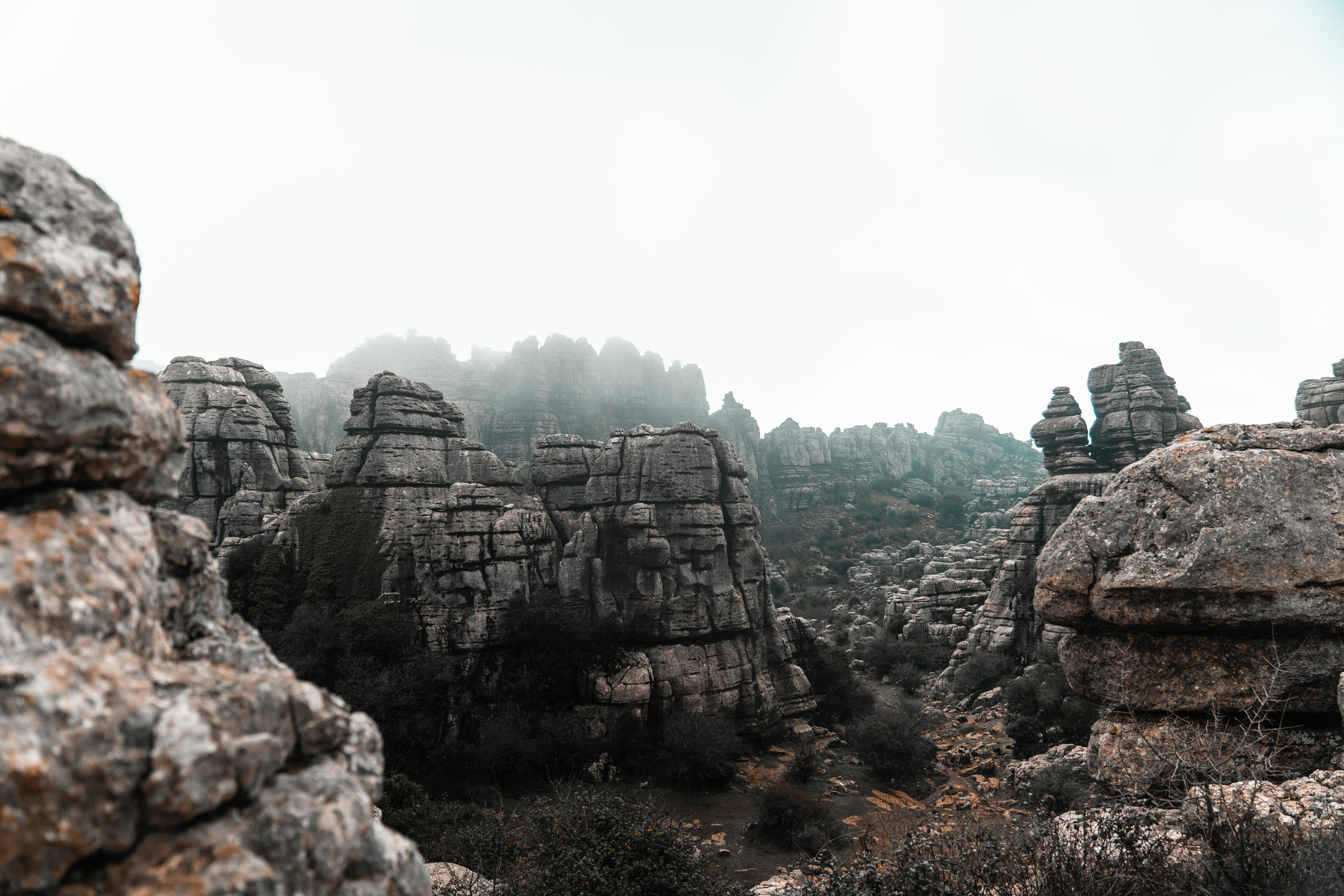 rock formation, grey, 5K, tranquil scene, outdoors, ancient, daytime, cliff, land, natural landscape, rock - object, nature, built structure, tranquility, HD Wallpaper