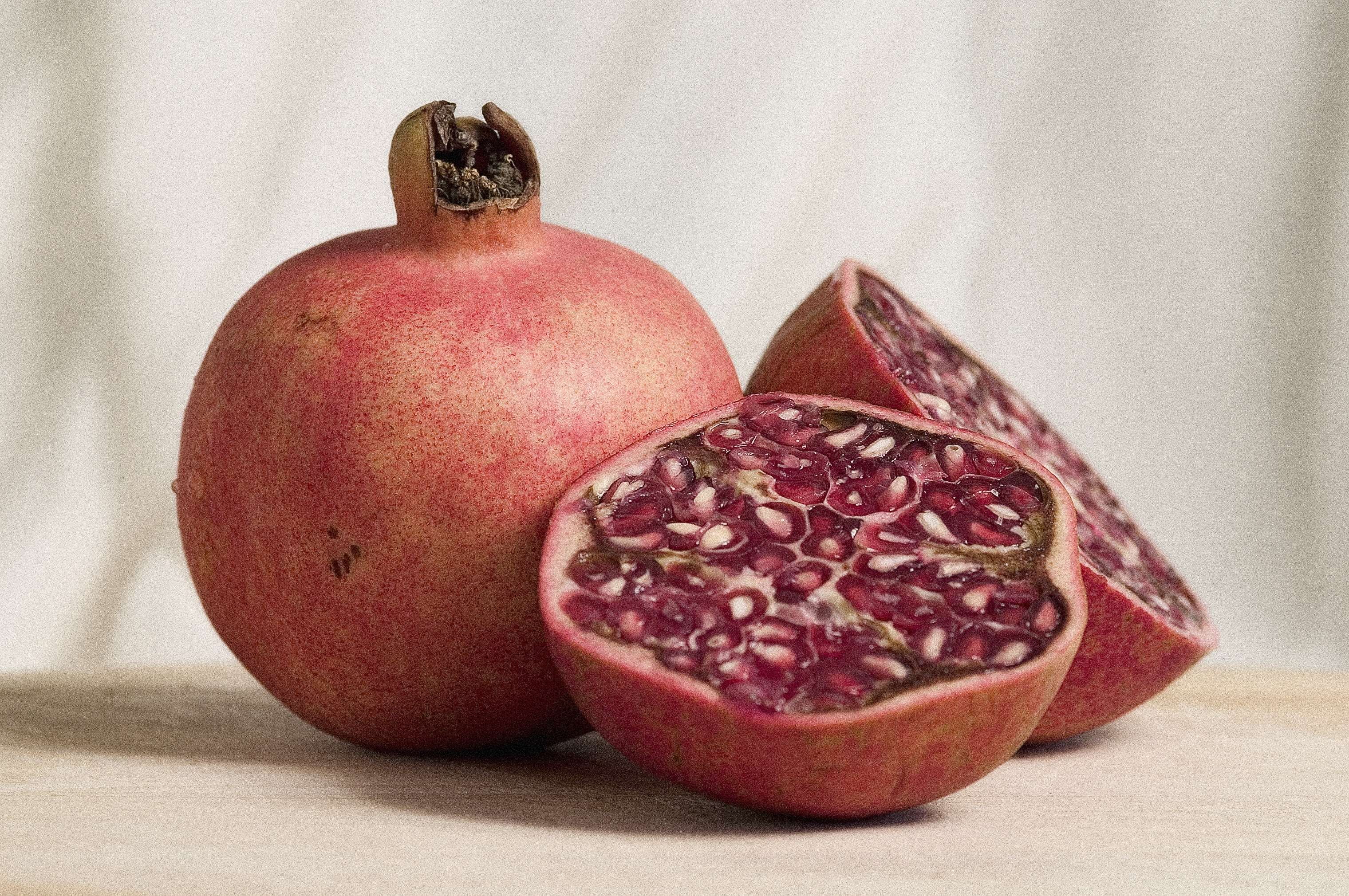 fresh, wellbeing, natural, pomegranate seed, healthy eating, light, halved, cross section, indoors, raw, table, pale, fruit, close-up, nutrition, nature, HD Wallpaper