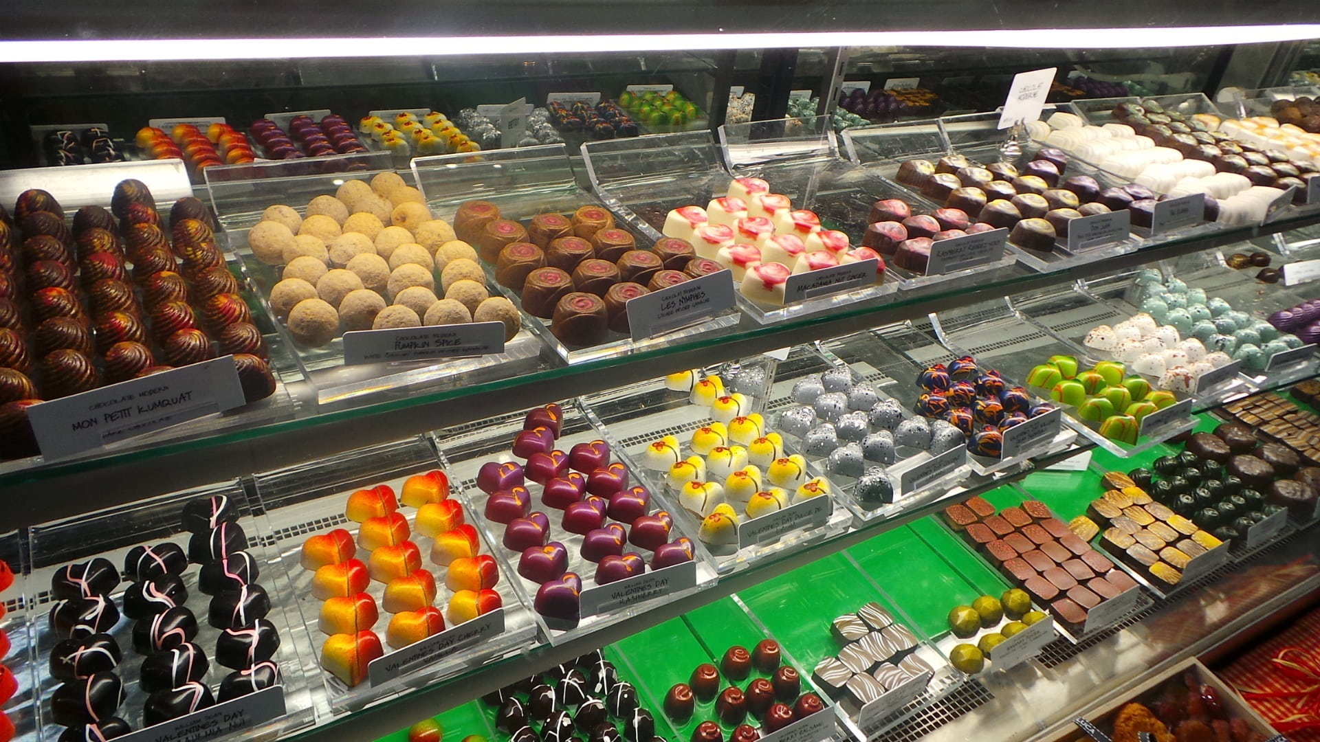 no people, in a row, retail display, confections, chocolate, macaroon, for sale, treats, display cabinet, assorted, variation, choice, merchant, consumerism, HD Wallpaper