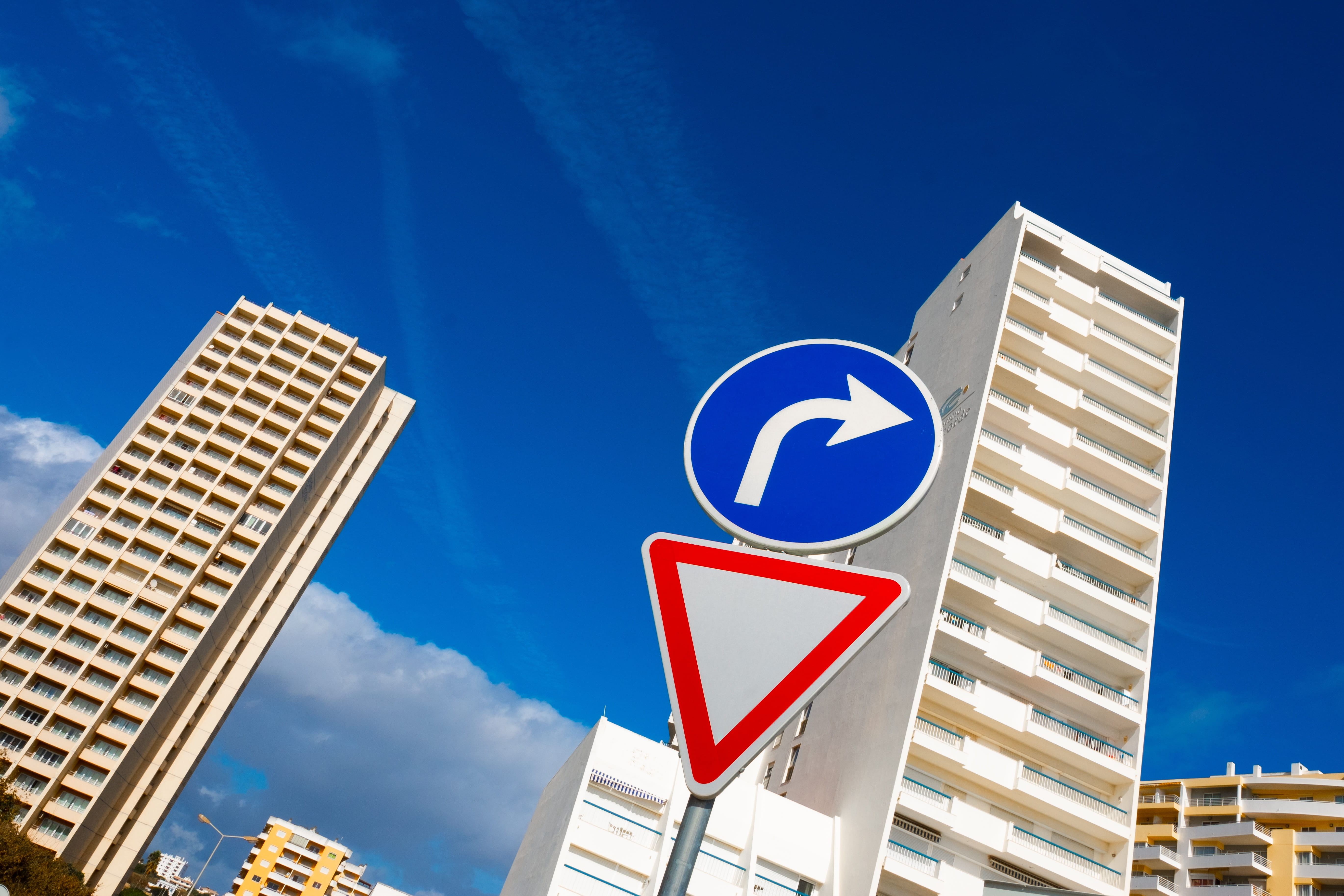 sign, road, attention, no people, skyscraper, outdoors, building exterior, perspective, right of way, low angle view, right, hotel, building, communication, HD Wallpaper